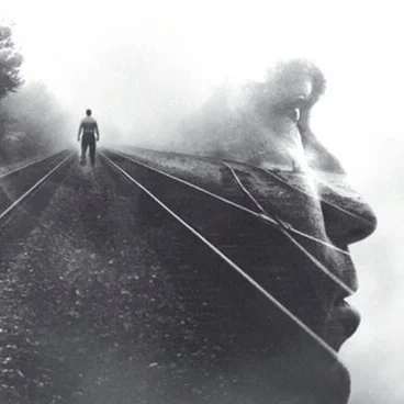 DoubleExposureManOnTracks.jpg