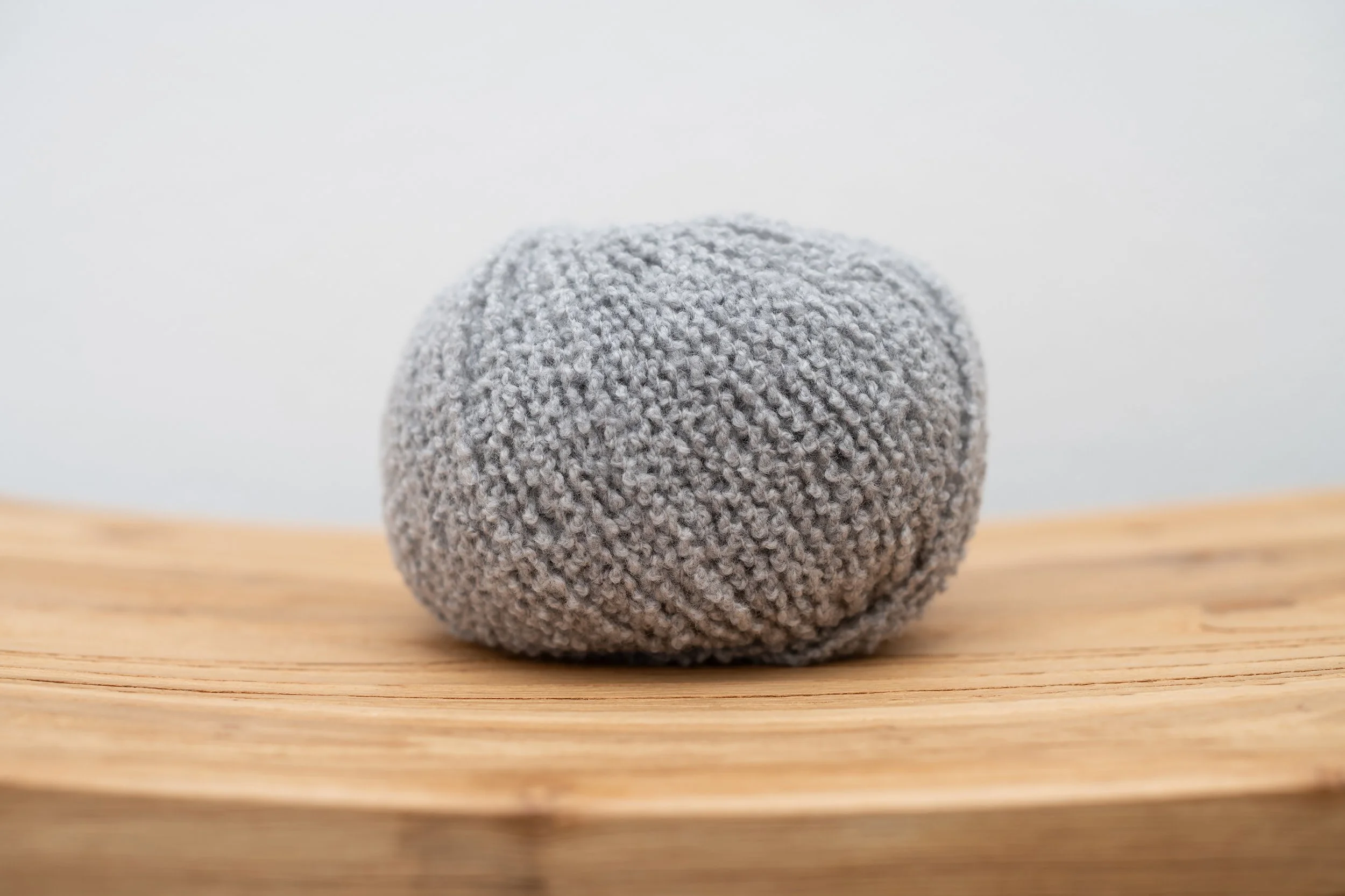 Lamana Como Grande Boucle yarn in the color Light Grey for Julie Hoover Bailey knitting project kit