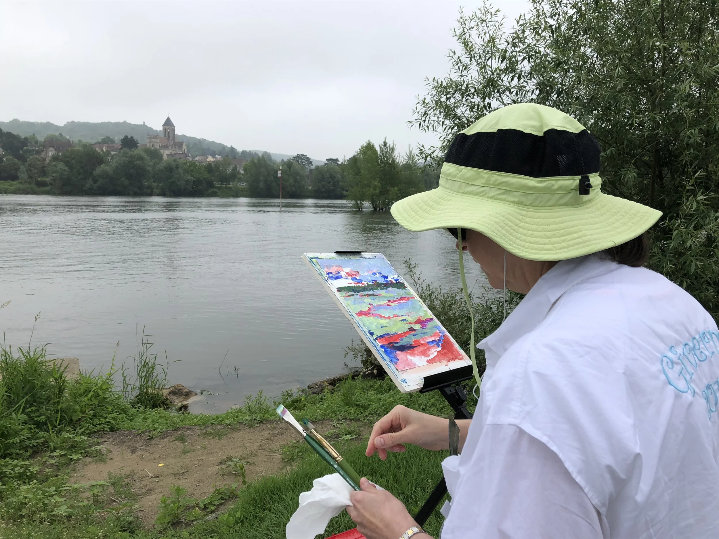 No shade in Lavacourt, looking across the Seine to Vethueil--the hat was vital! Note how I am nonchalantly sticking palette knives in shirt pockets in order to have them handy.