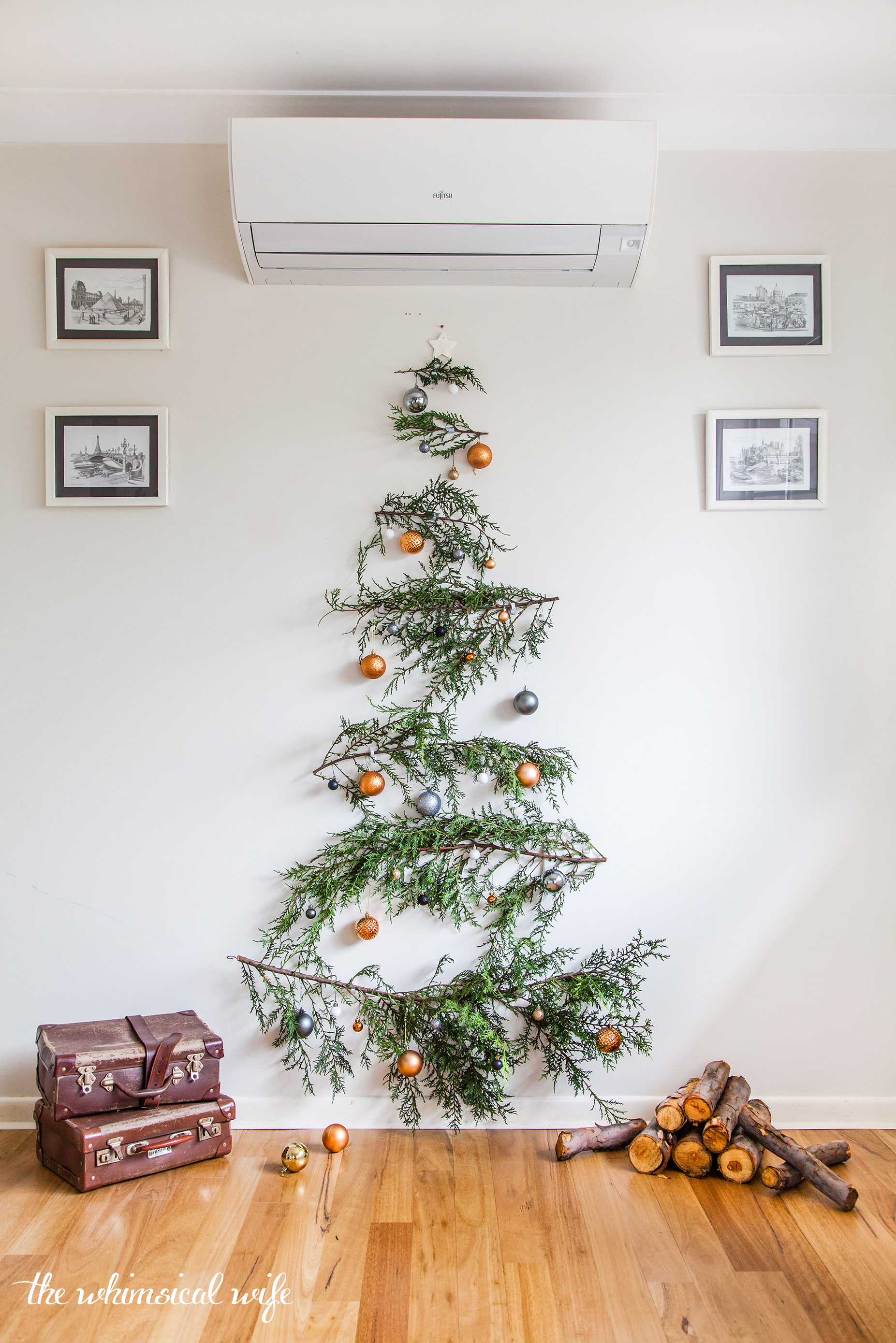 Put extra Christmas tree branches to good use with this DIY holiday  decoration 