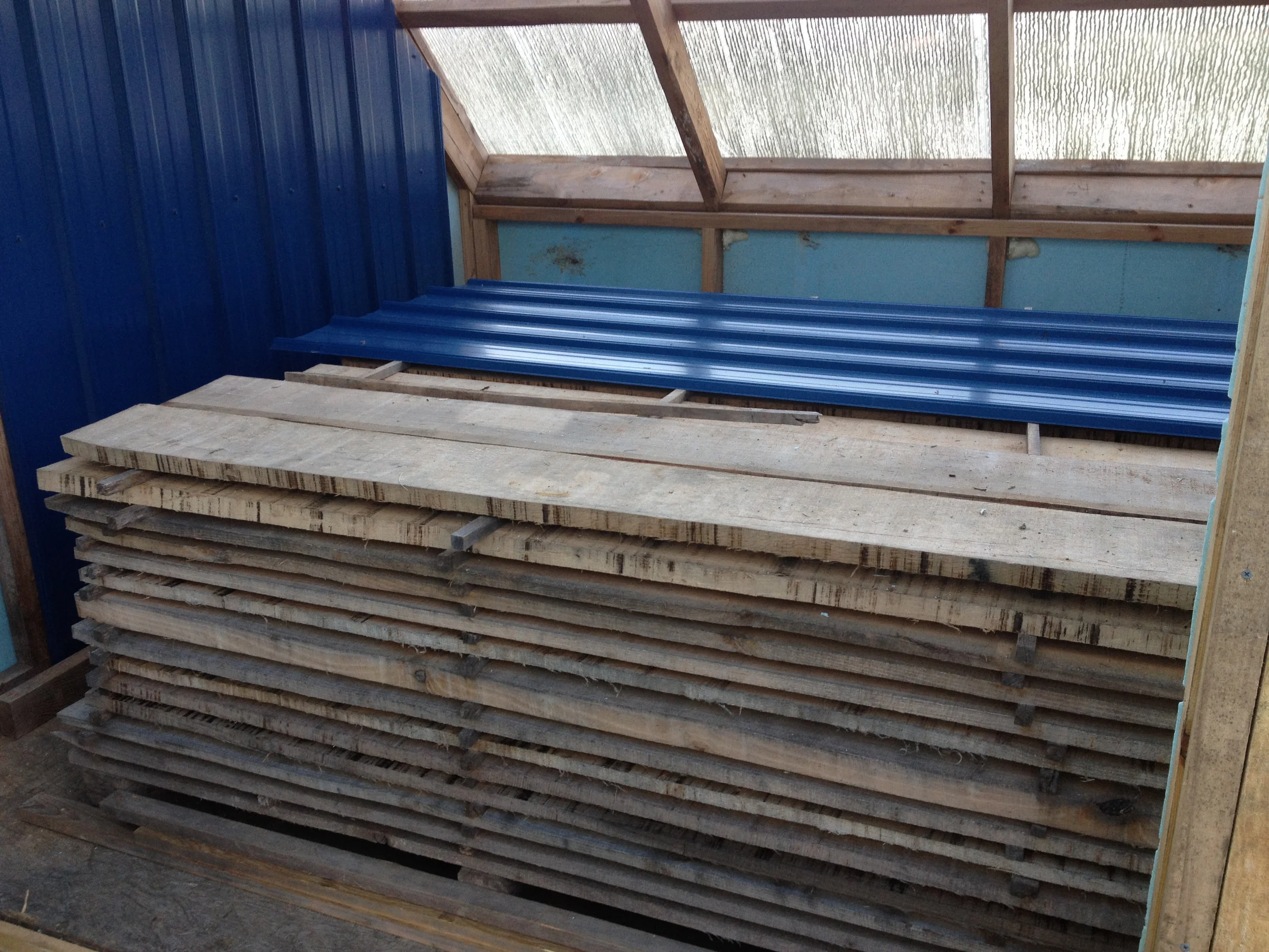 Our solar powered kiln dries lumber for cabinets and furniture!