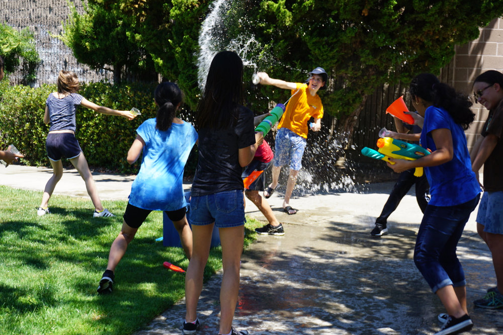 senior campers enjoying some unstructured playtime during water olympics