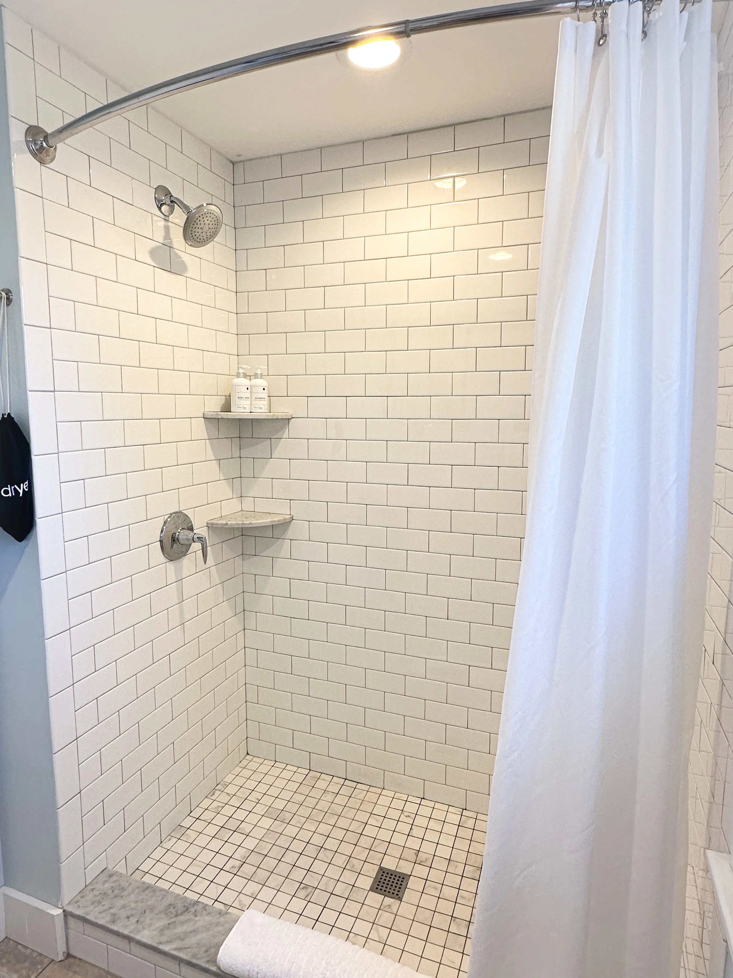Bathroom in Room 8 at The Sailmaker’s House with tiled walk-in shower and nautical-inspired details