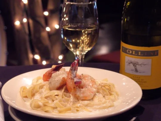 Our creamy Fettuccine Alfredo with jumbo shrimp.