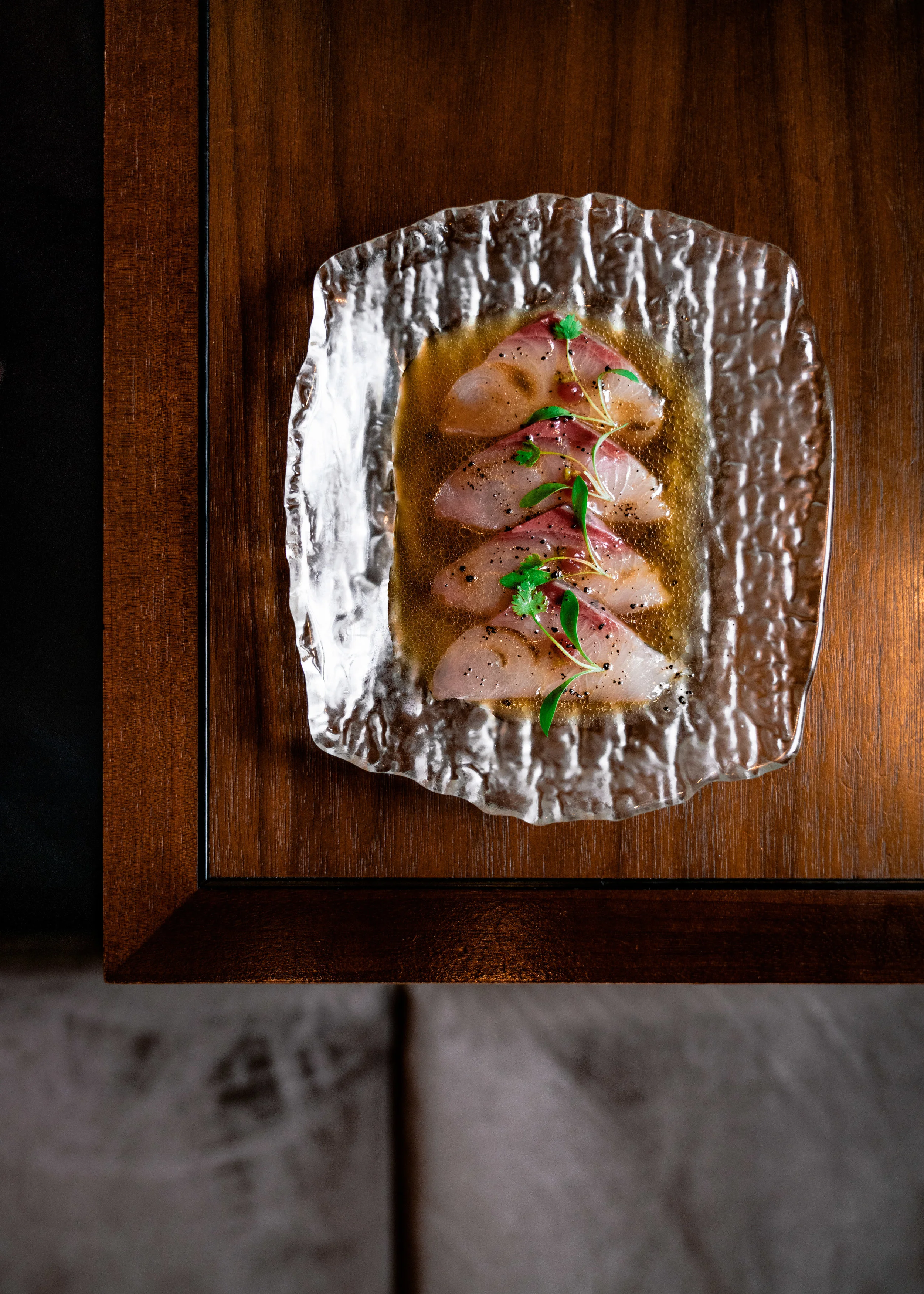 Yellowtail carpaccio with truffle ponzu dressing