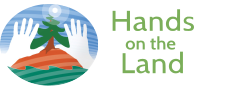 logo hands on the land.png