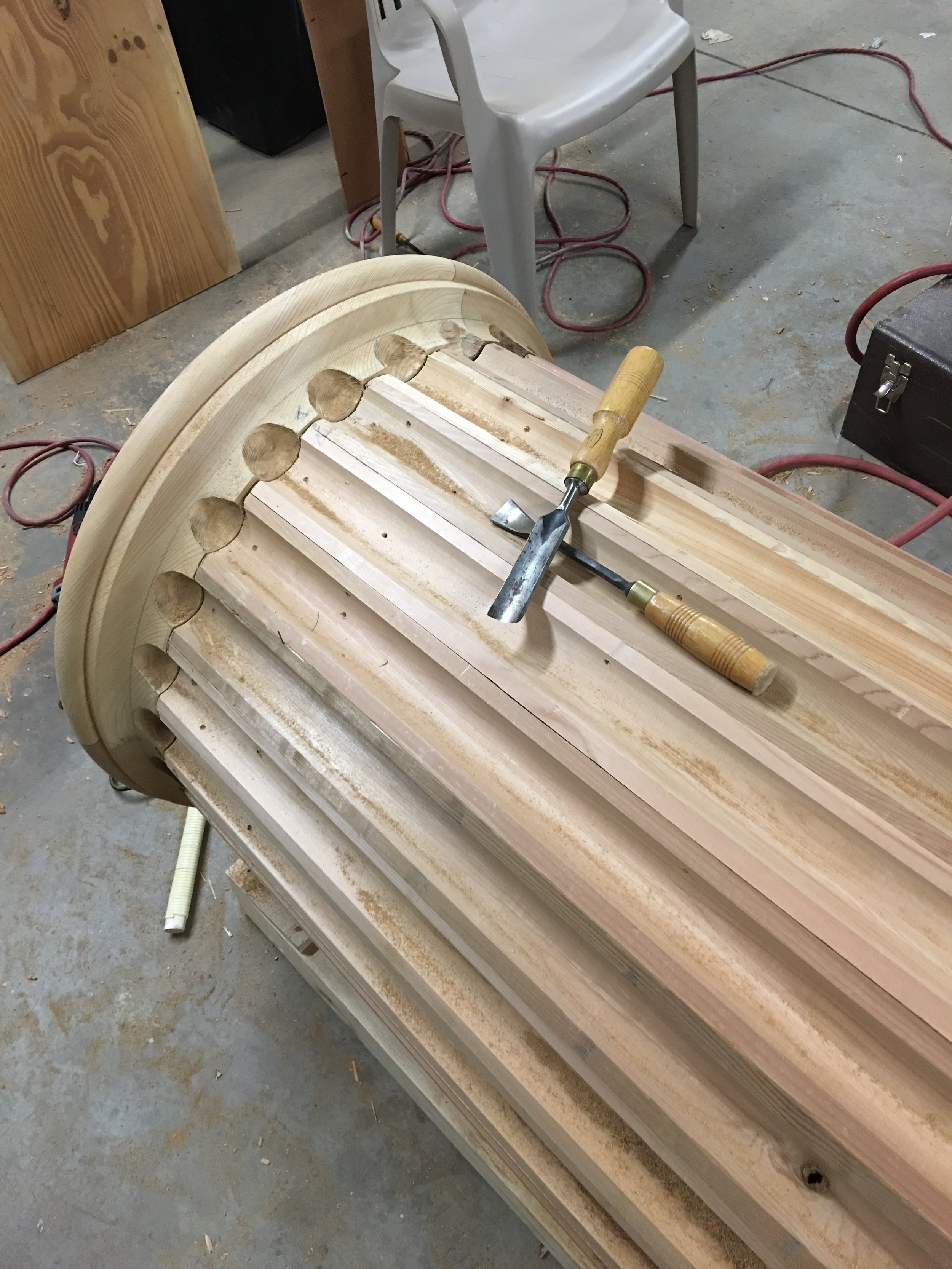 Carved "terminating" flutes