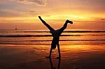 silhouette-of-child-on-beach-10078853.jpg
