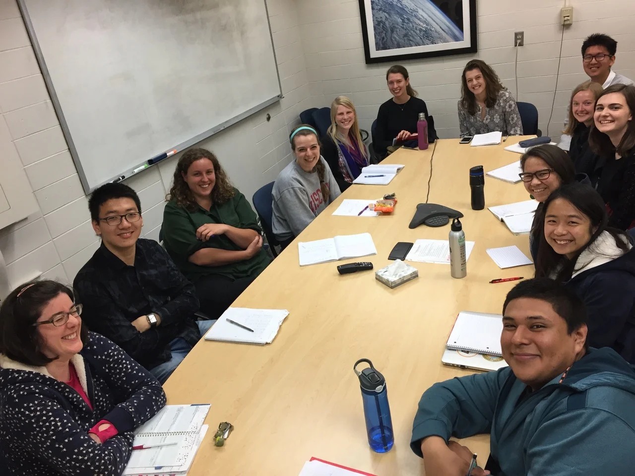 This photo is from one of our weekly group meetings with many of our past team members.