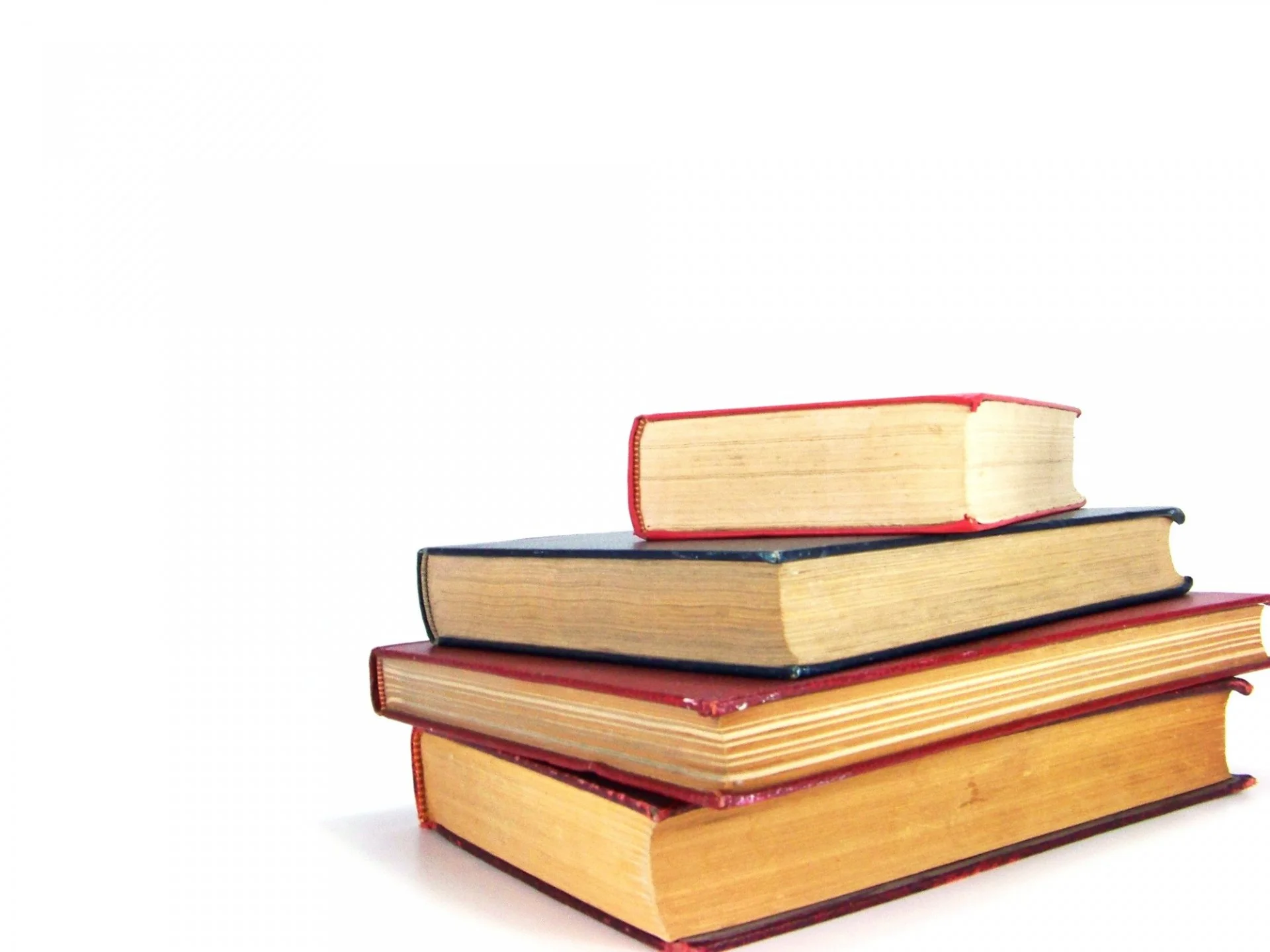 Stack of books against white background