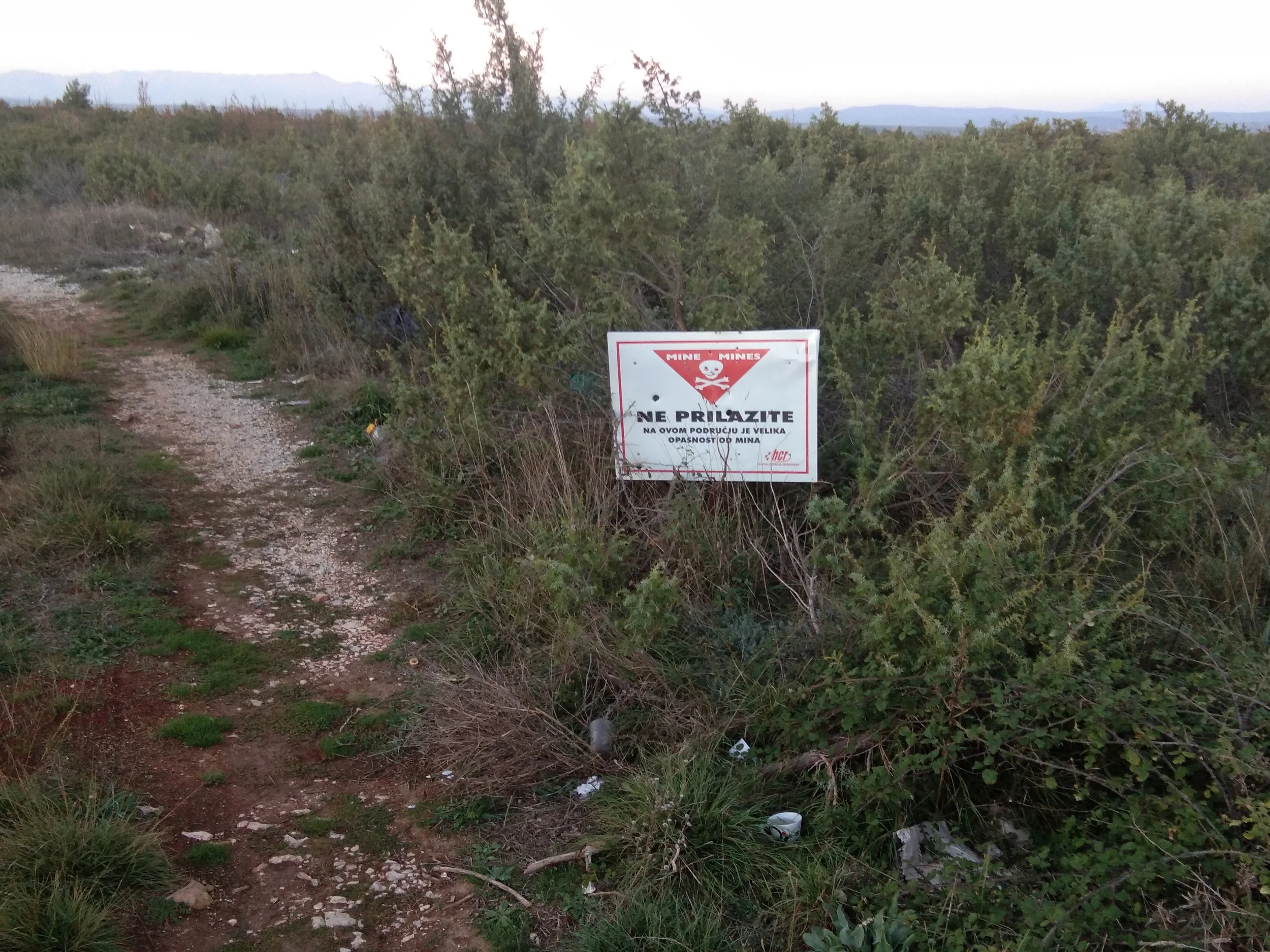This warning sign states that the area hasn’t been cleared and may contain land mines left over from the Croatian War of Independence.