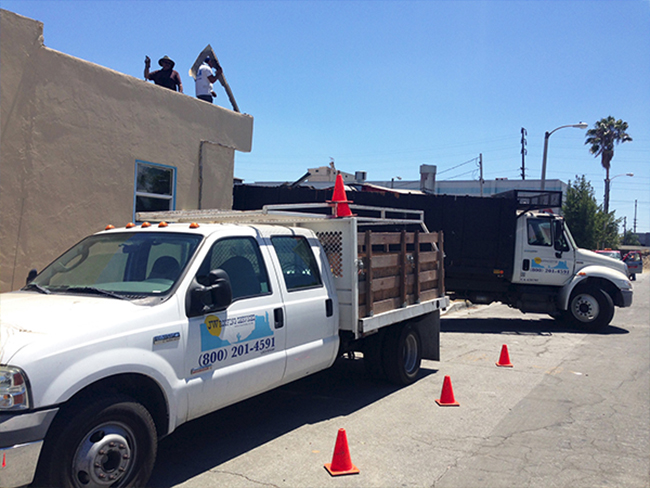 jw-roofing-crew-install-new-flat-roof-clean-up-tear-off-tune-up.jpg