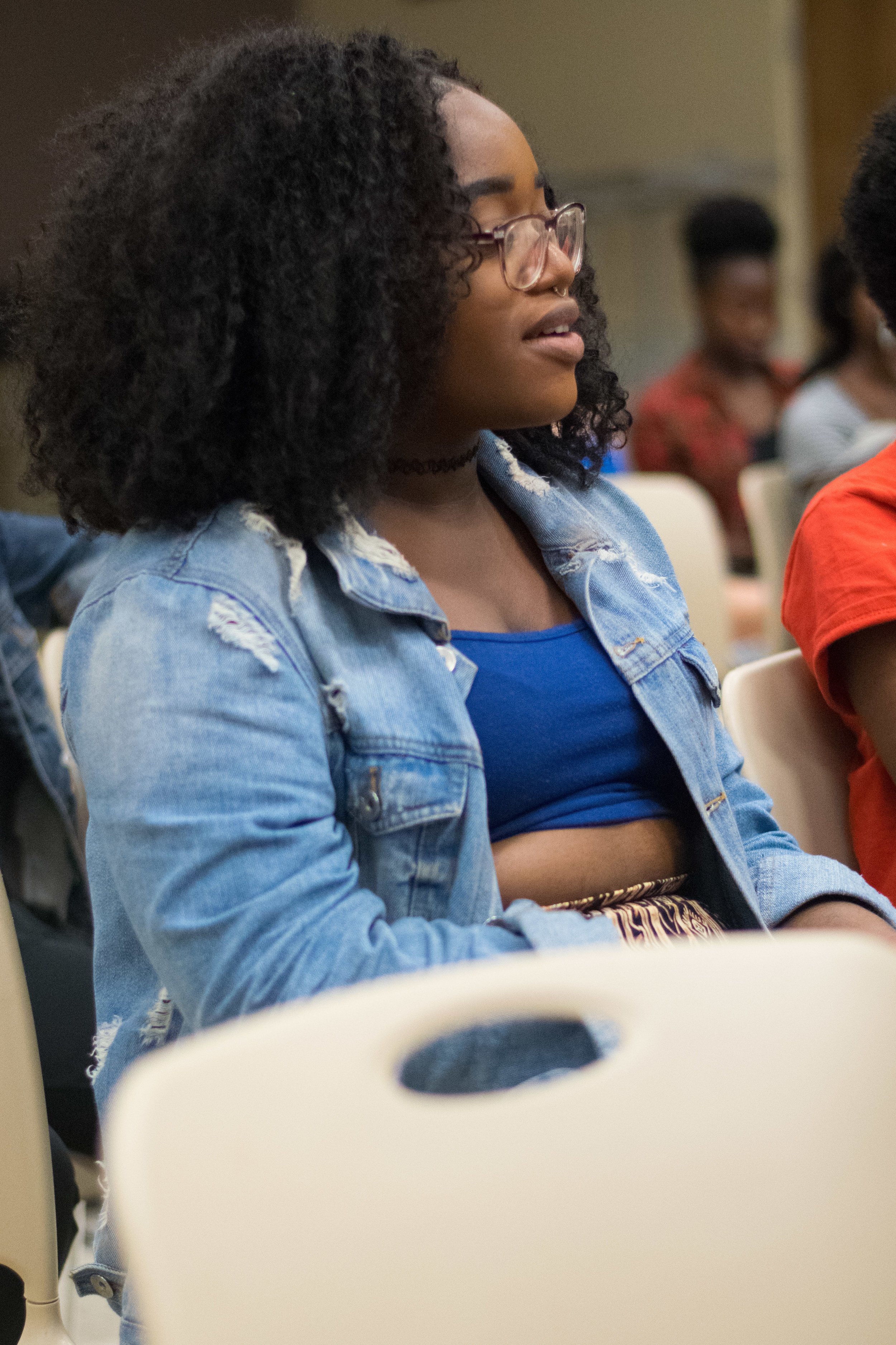 Erika Tarawallie, freshman undecided, reflects on footage of a football fan burning all his fan paraphernalia in counterprotest to NFL players taking a knee. Tarawallie notes the irony of the situation: the man burning his clothing vows not to support the NFL, yet his viral video provides the league with more publicity. Photo: Amina Lamkin