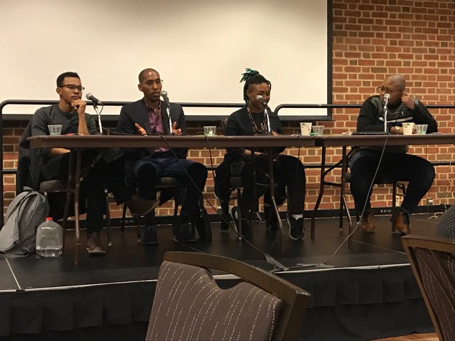 Panelists take turns answering questions from the audience (Jazmin Conner/For The Black Explosion)