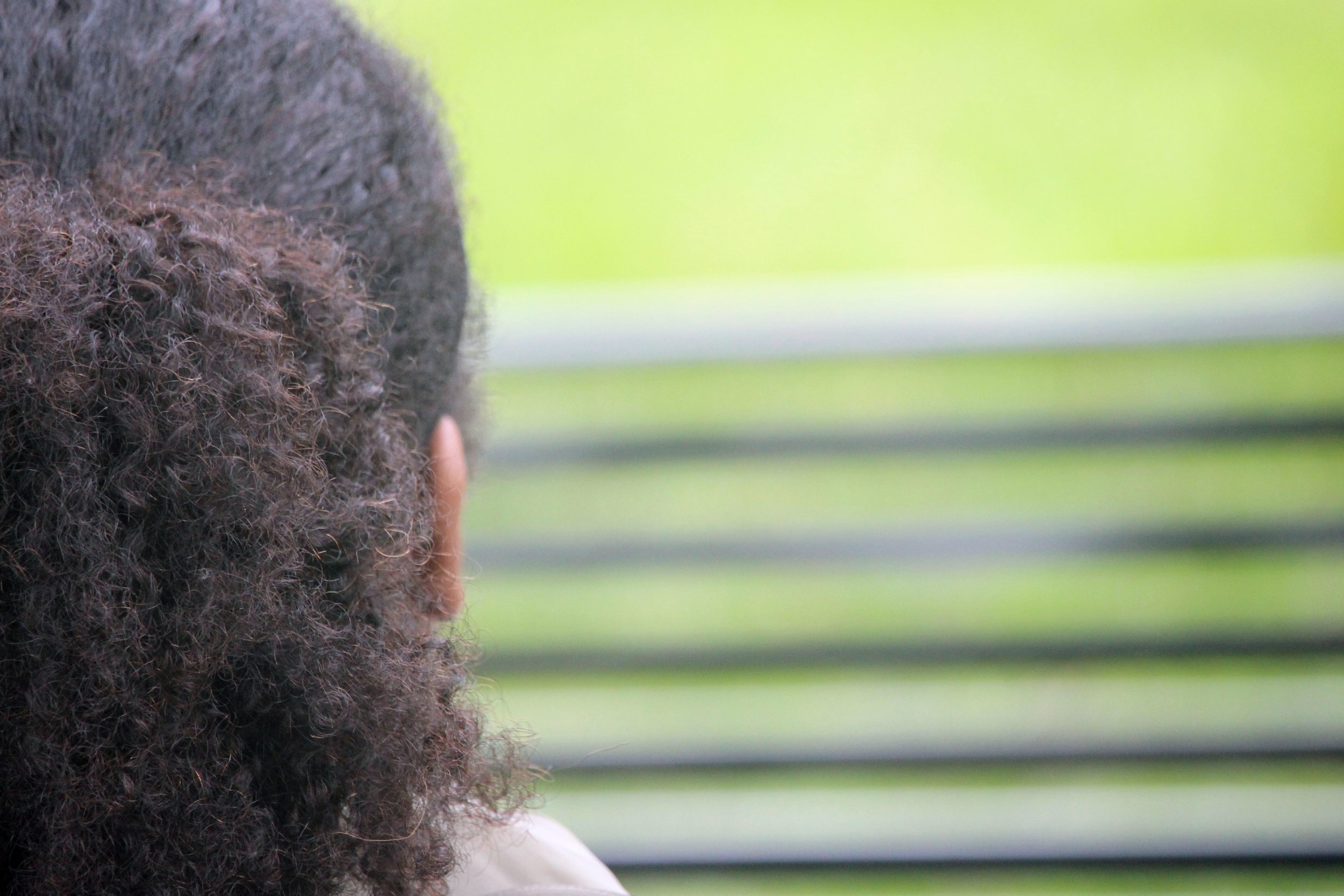 Bianca Ngala, a sophomore behavioral and community health and public policy double major, sits near the benches during a photoshoot outside of Hornbake Library in College Park, Md. on Friday, Oct. 26, 2018. (Alexandra Glover/The Black Explosion)