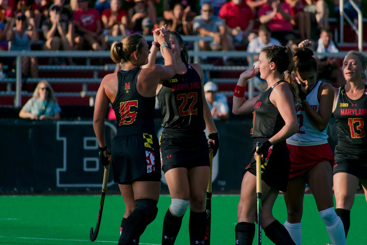 Defenders Bodil Keus and Riley Donnelly are shown celebrating after a goal against the Richmond Spiders (Gabby Baniqued/The Diamondback)