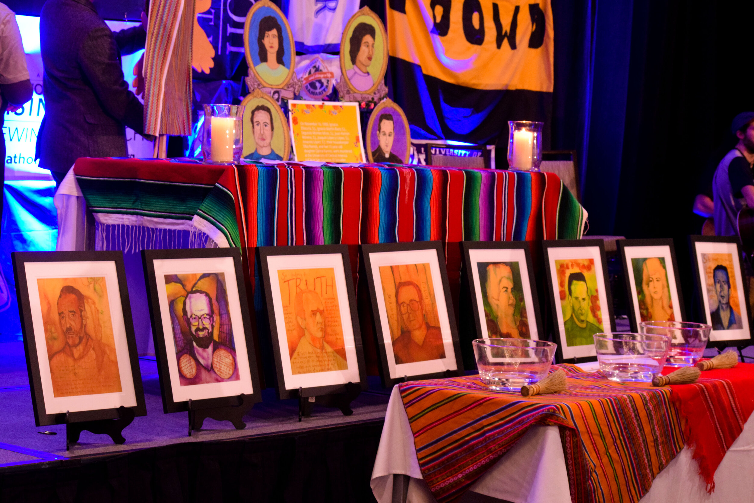  The altar at the 2019 Ignatian Family Teach-In for Justice in Washington, D.C., commemorates the El Salvadoran martyrs of 1989 at the Sunday mass. During the Salvadoran Civil War on Nov. 16, 1989, Salvadoran Army soldiers killed six Jesuits and two 