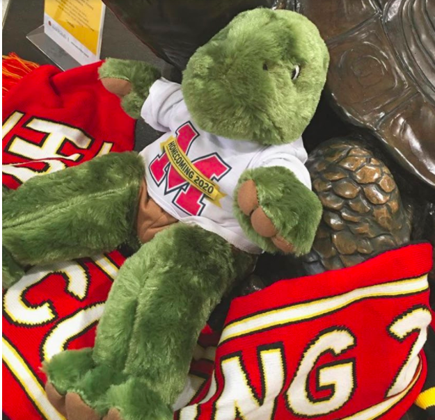 A Build-a-Bae turtle made at Adele H. Stamp Student Union building sits in front of Testudo and on a new 2020 homecoming scarf. (@thestampumd/Instagram)