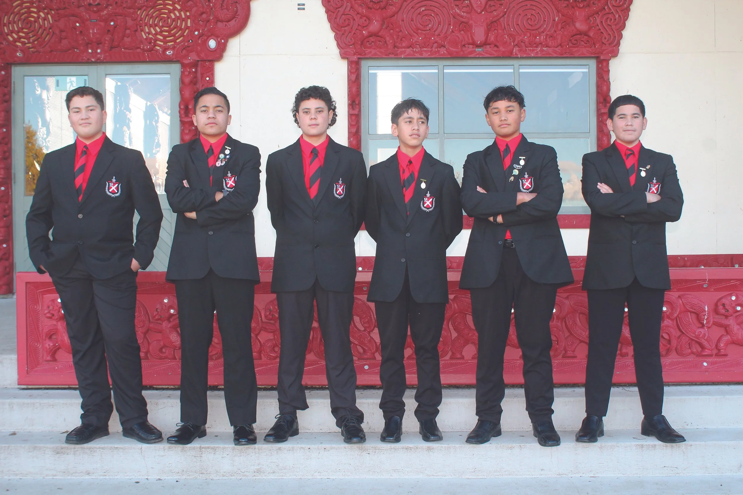boys outside wharenui in No 1s.jpg