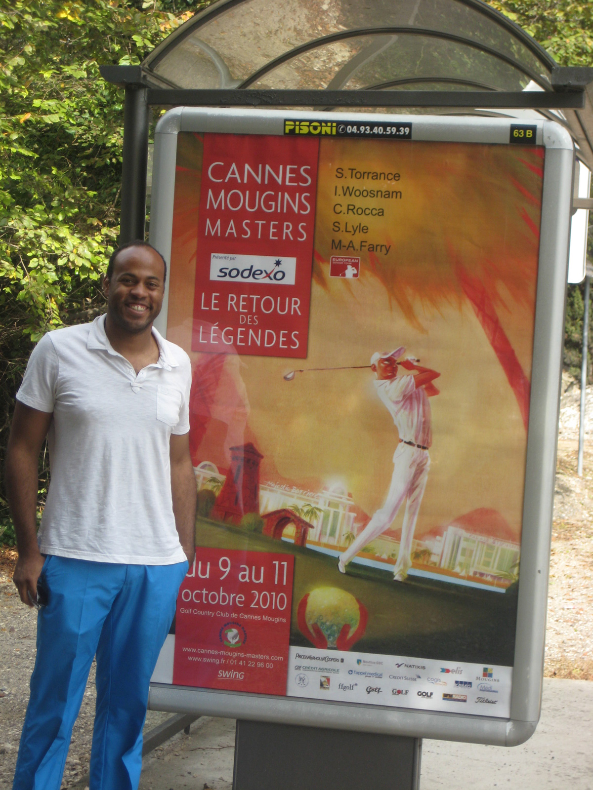 Devin Crane in front of the Cannes Mougins Poster he painted – Cannes, France