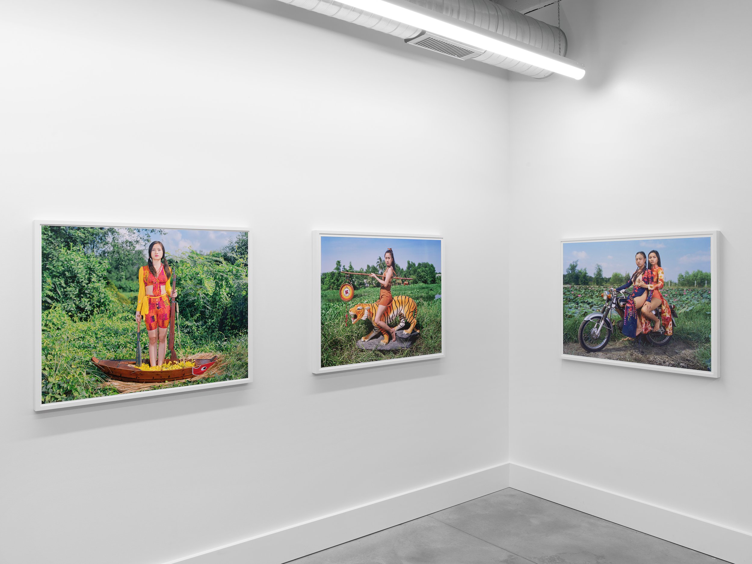  Installation view of Olivier Laude:   Chiến Thắng Ba Tơ left to right:  Sis{Quynh}-naut, Hổ Di, &amp; Pro Bono Publico II,  