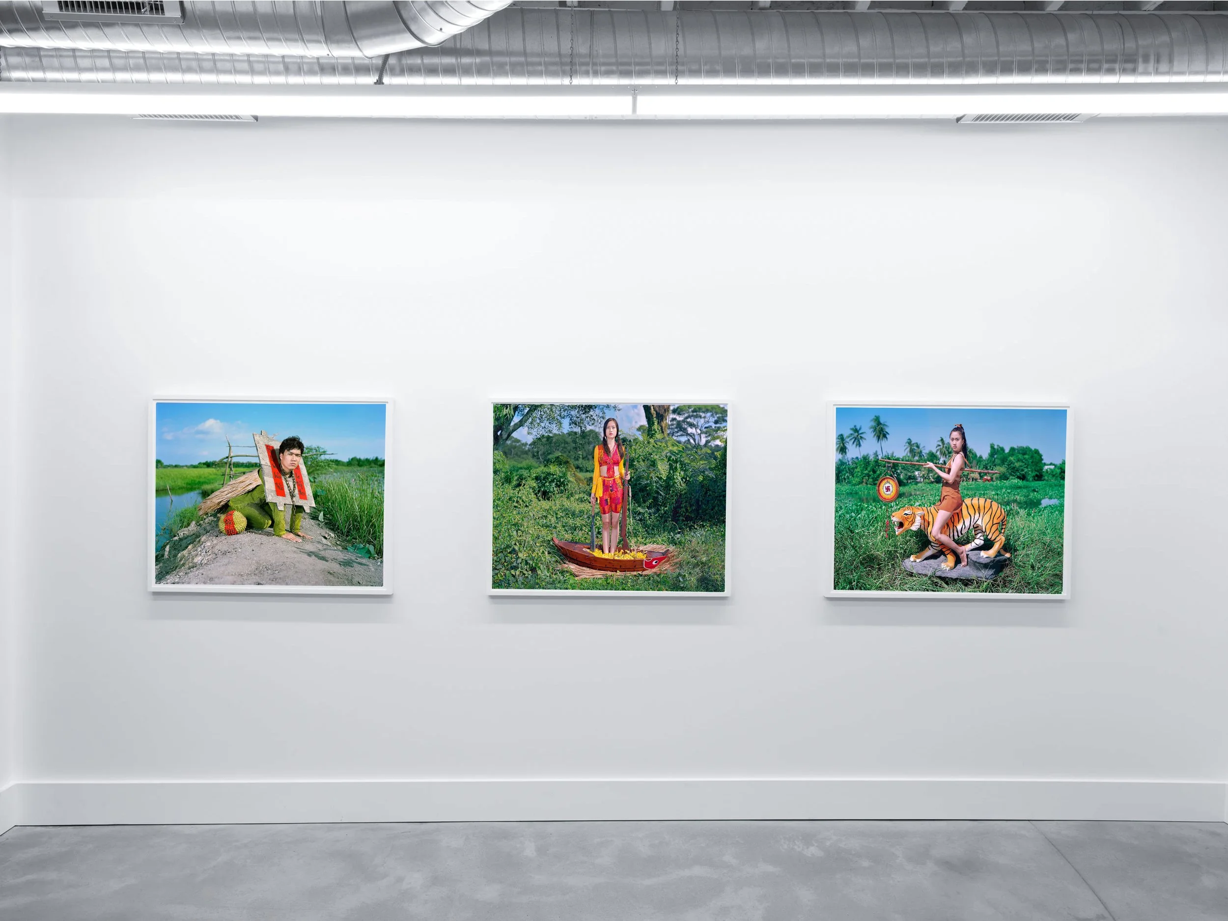 Installation view of Olivier Laude: Chiến Thắng Ba Tơ left to right: Cáng-e, Sis{Quynh}-naut, Hổ Di,