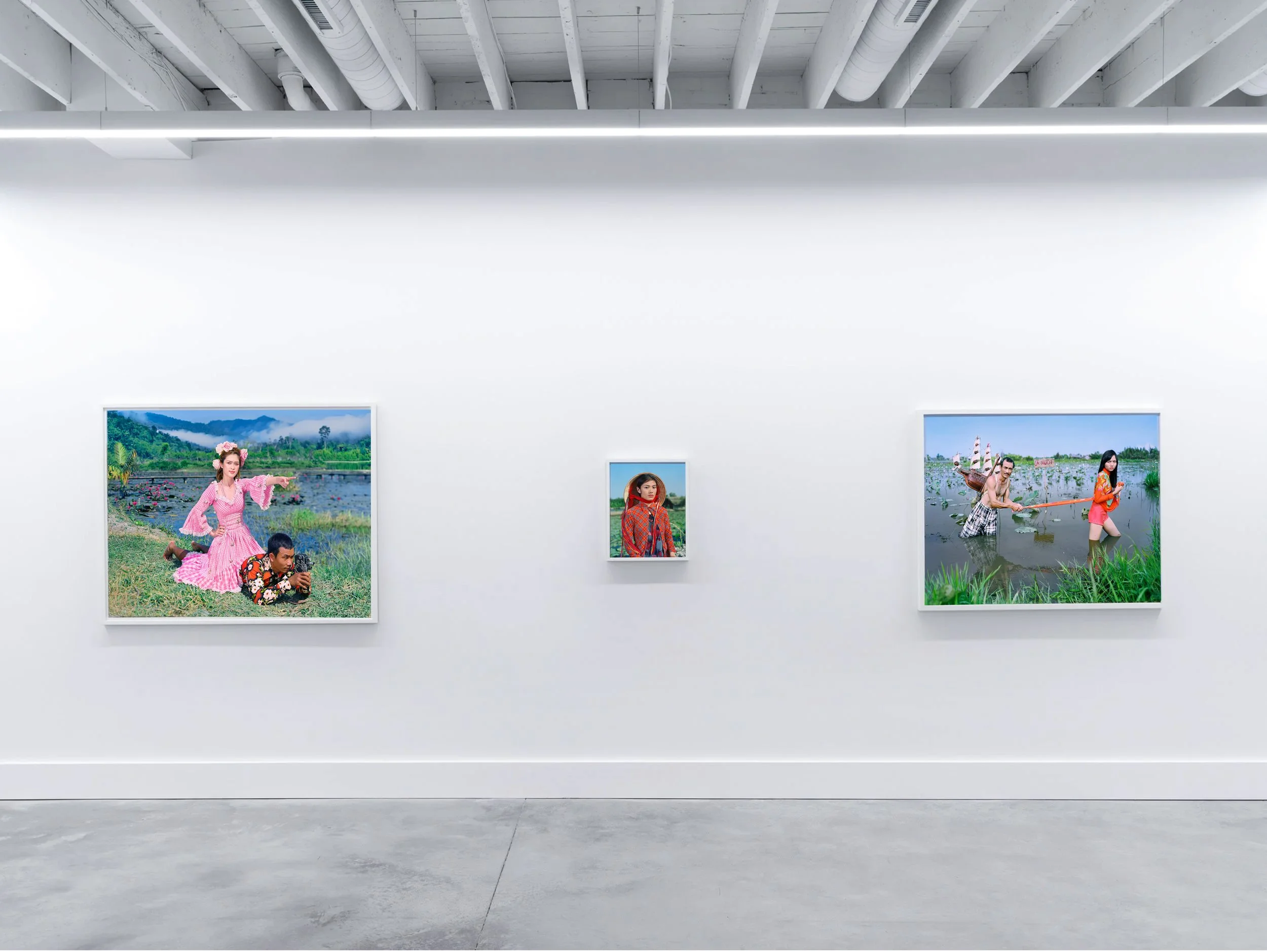 Installation view of Olivier Laude: Chiến Thắng Ba Tơ left to right: Moving-Antoine-Nguyệt, Ôi tiếng việt, & Cá Nuôi..