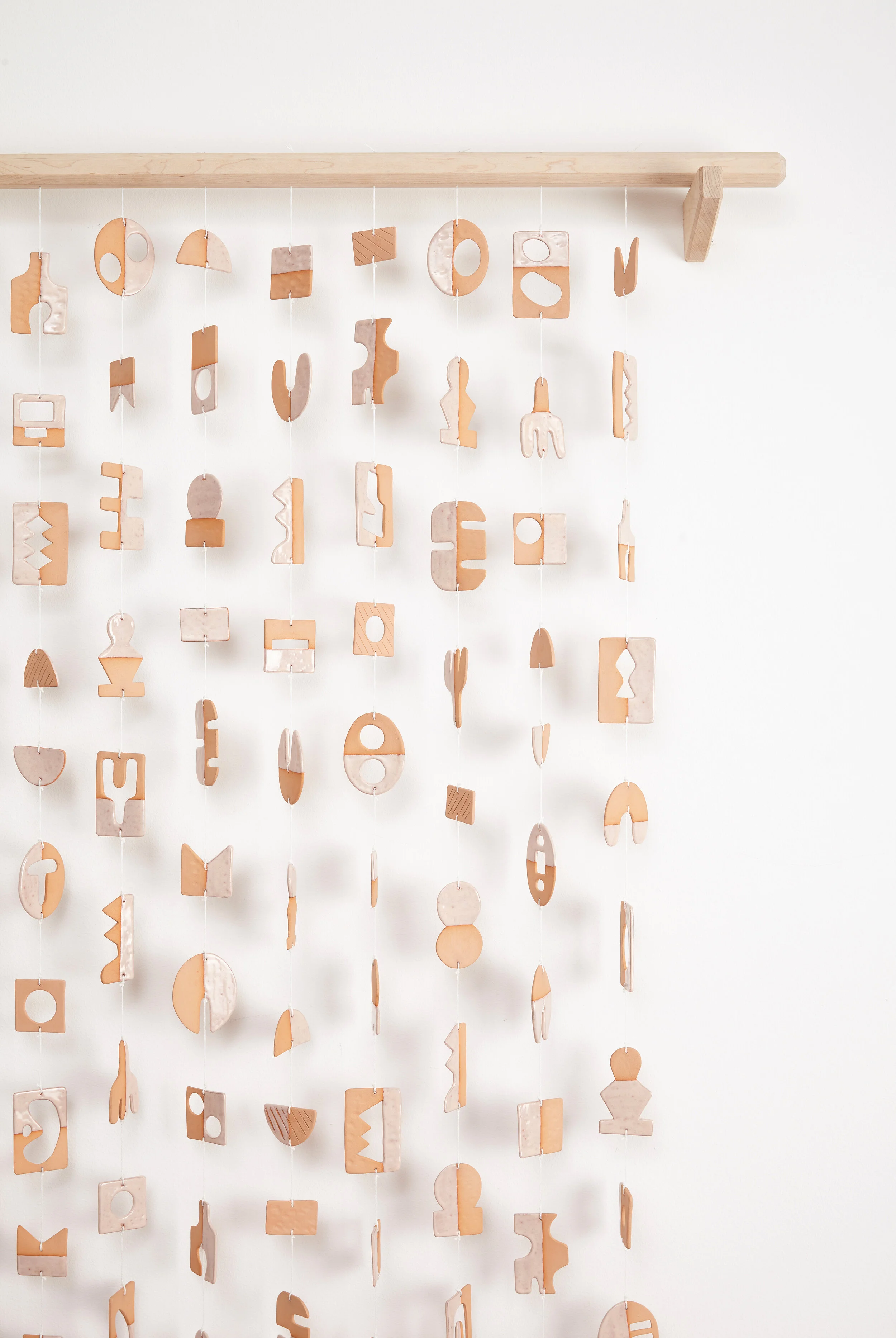 pink-shape-ceramic-wall-hanging-stick-detail.jpg