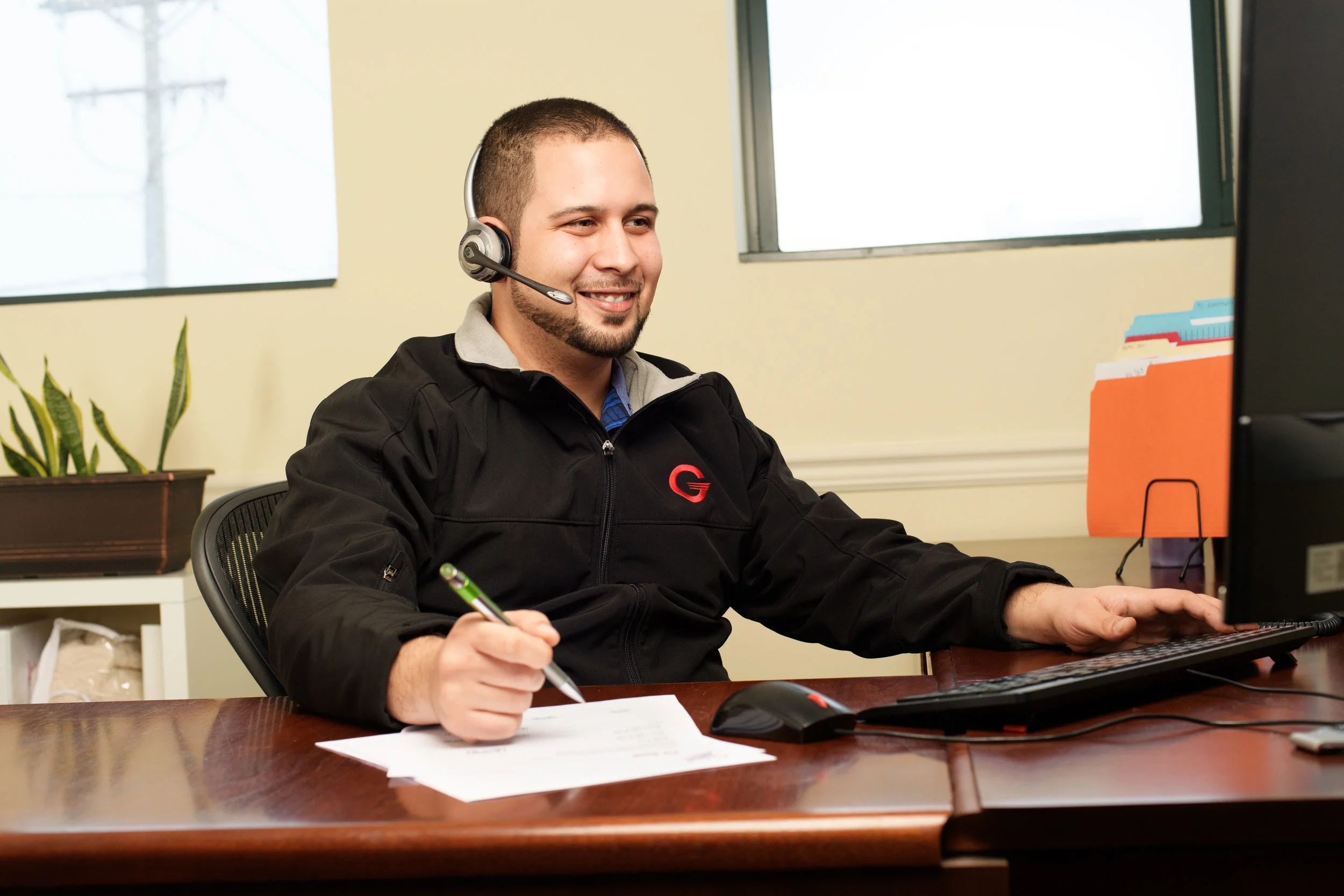 GHS_Customer_Service_Joe_Using_Headset_2.jpg
