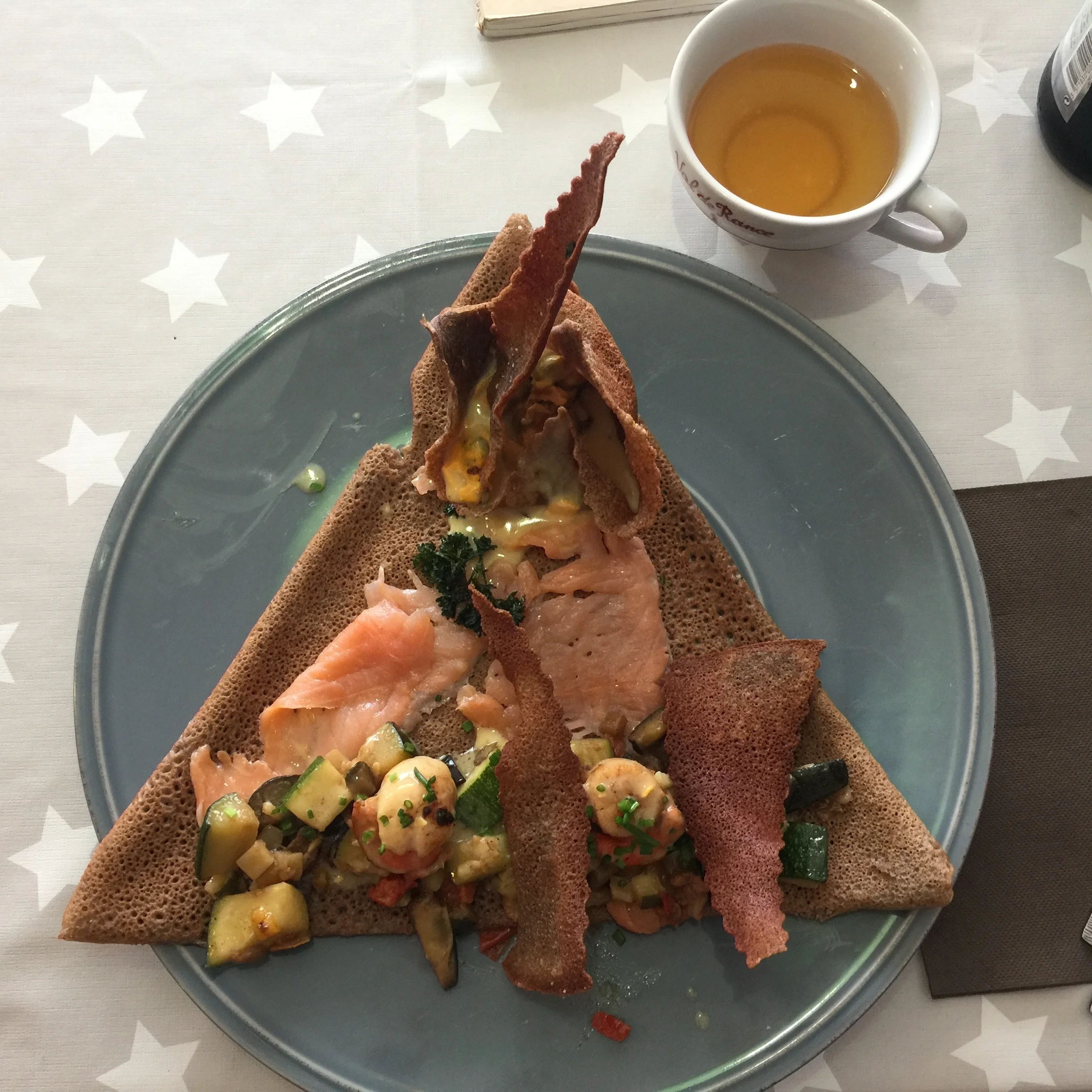 An artsy seafood galette (buckwheat pancake).&nbsp;