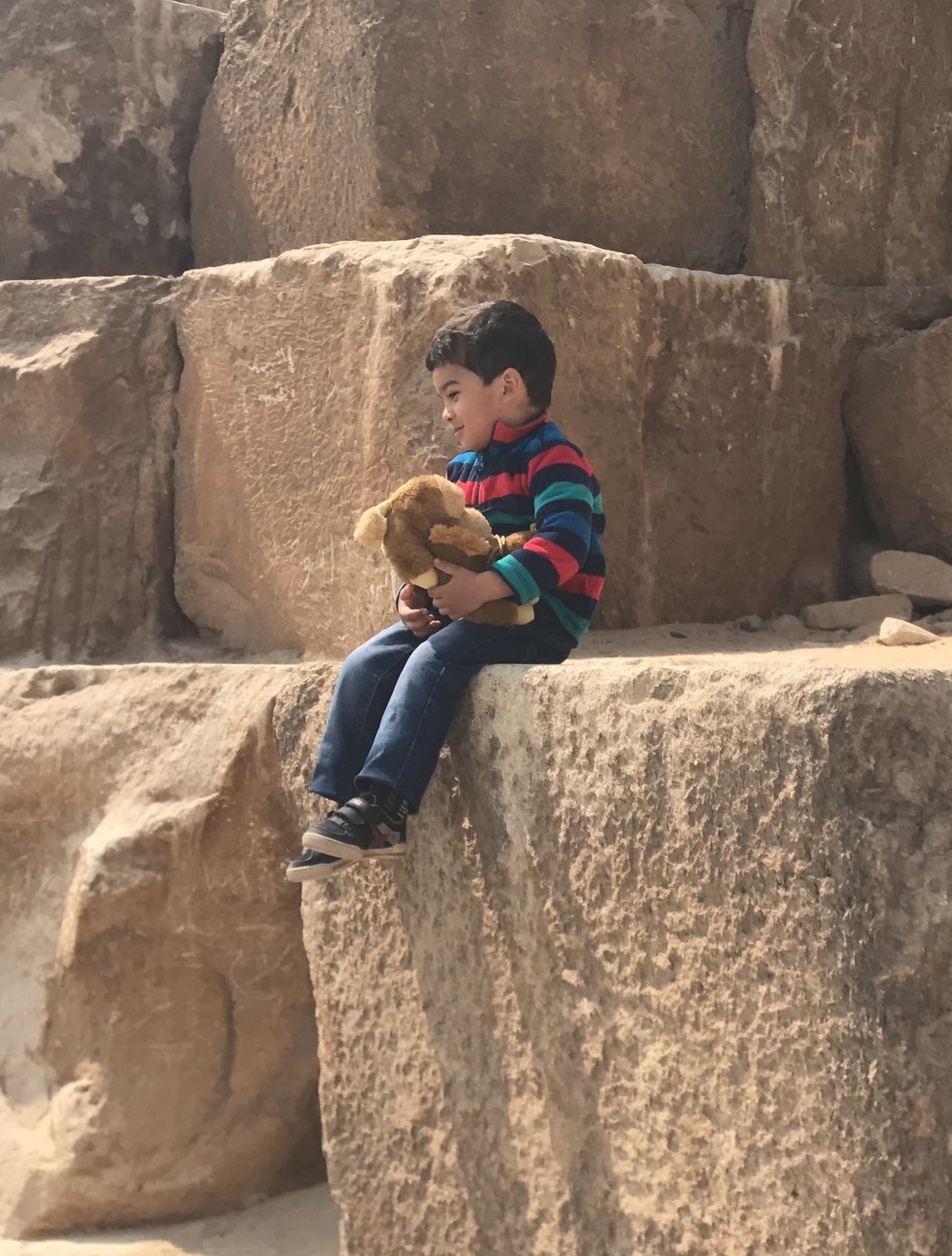 Boy on the Great Pyramid (by Erika Mermuse)