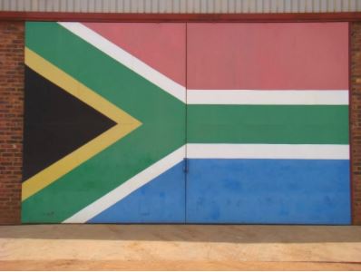 The South African flag painted on an equipment shed at Beestepan Farm.