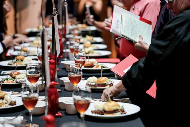 Chefs compete at the Cochon 555 BBQ Festival to create the best dish using heritage pork. The meat has grown in popularity as people become aware of its unique flavor. Photo from farmflavor.com