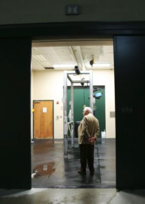 Dr. Allen looked through one of the modern exam rooms located at the AU Vet Med facility. He said many things had changed since began attending in 1951.