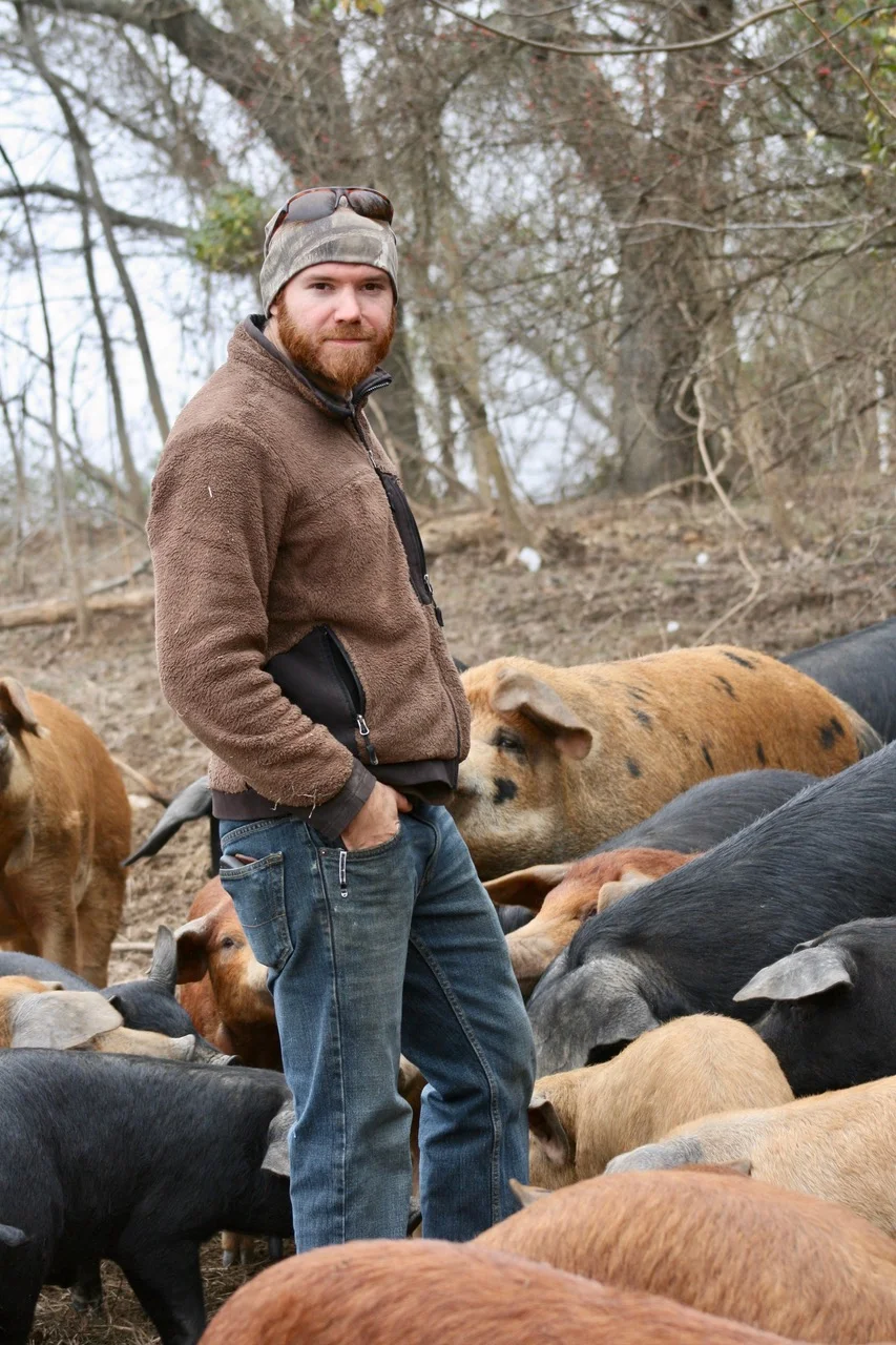 Tyler Green raises hogs on his farm in Garrard County.