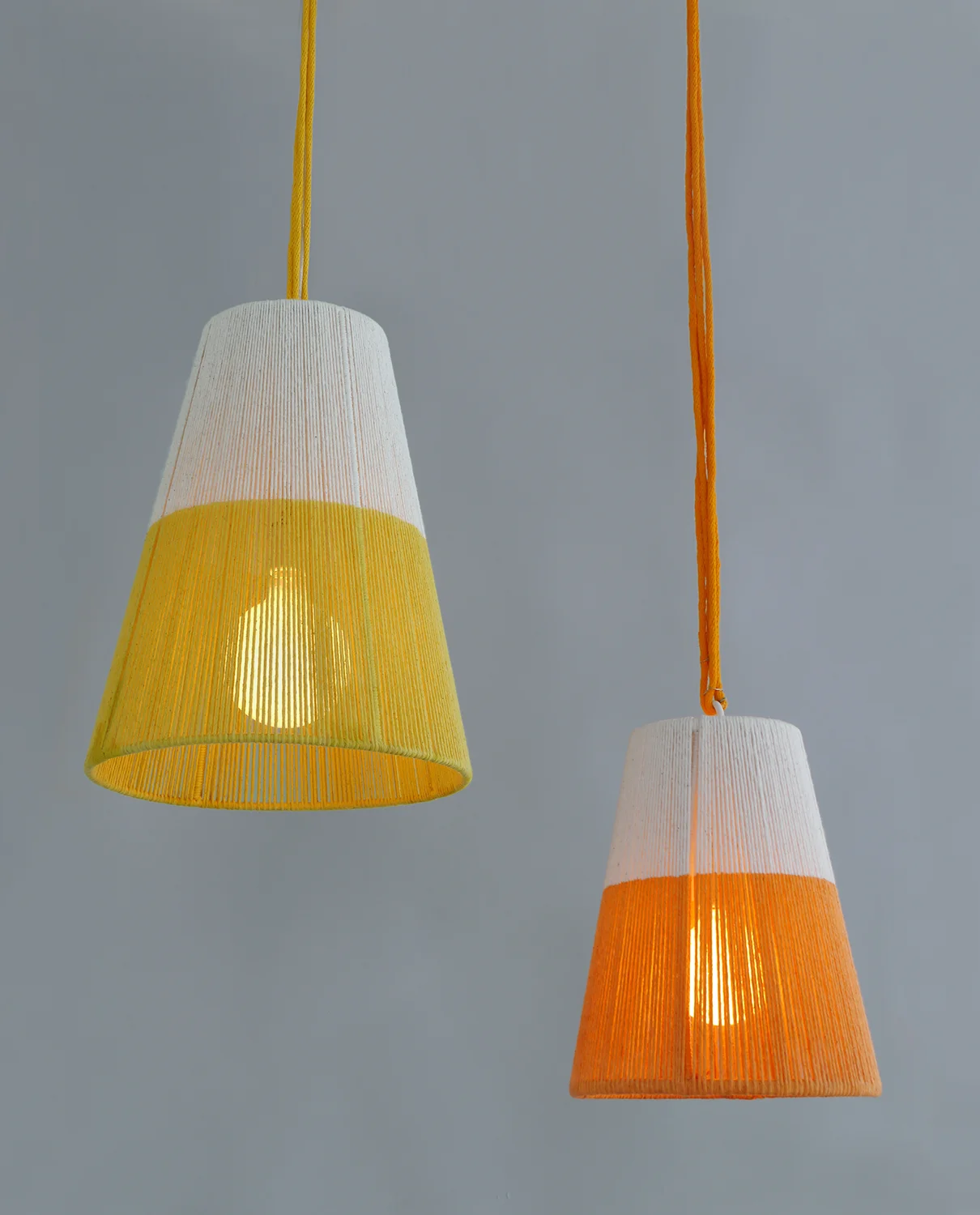 Rope_C-182_Horizon String Tapered Pendant_White_Yellow and Orange_on.jpg