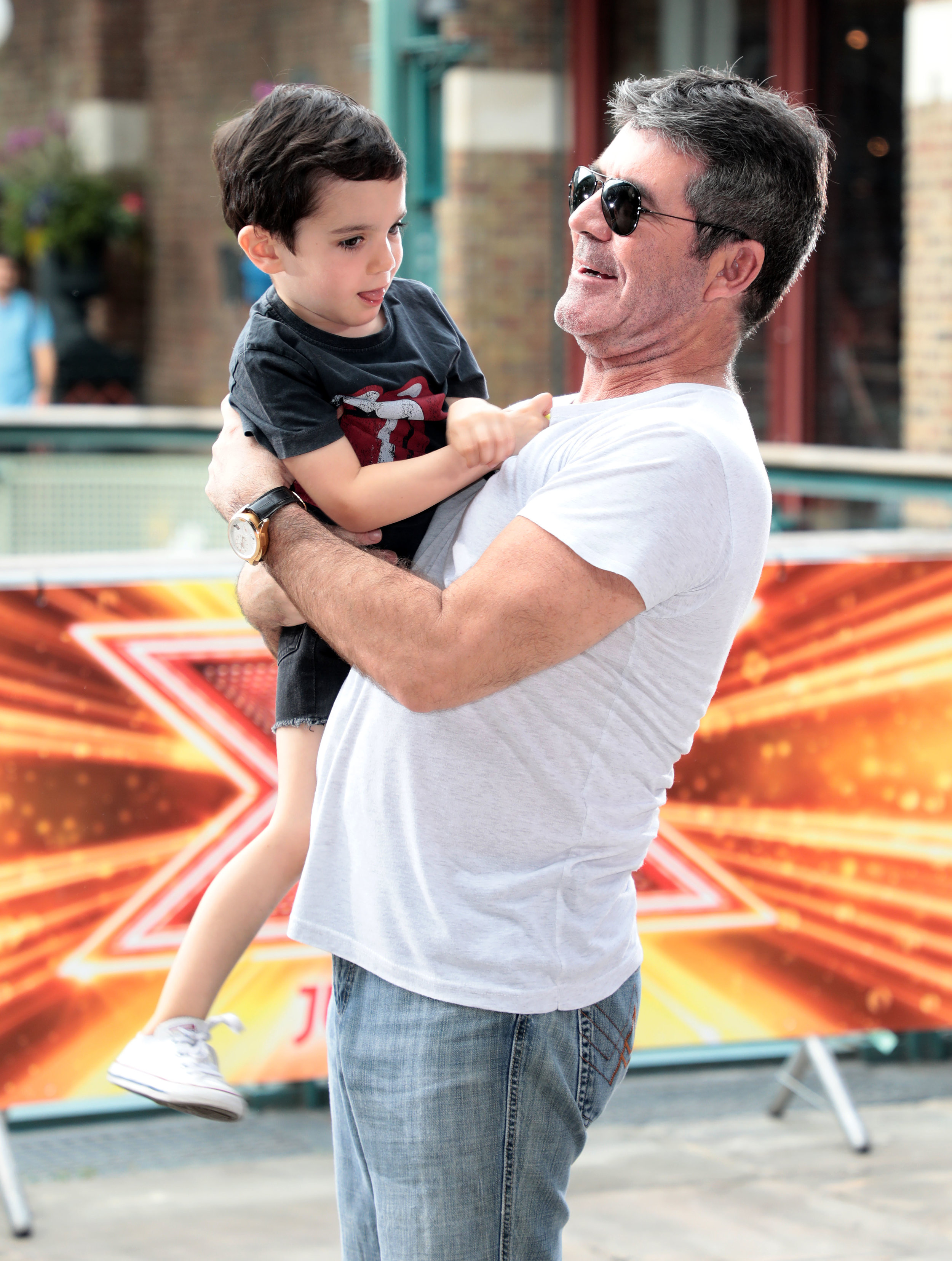 Simon Cowell and his son Eric