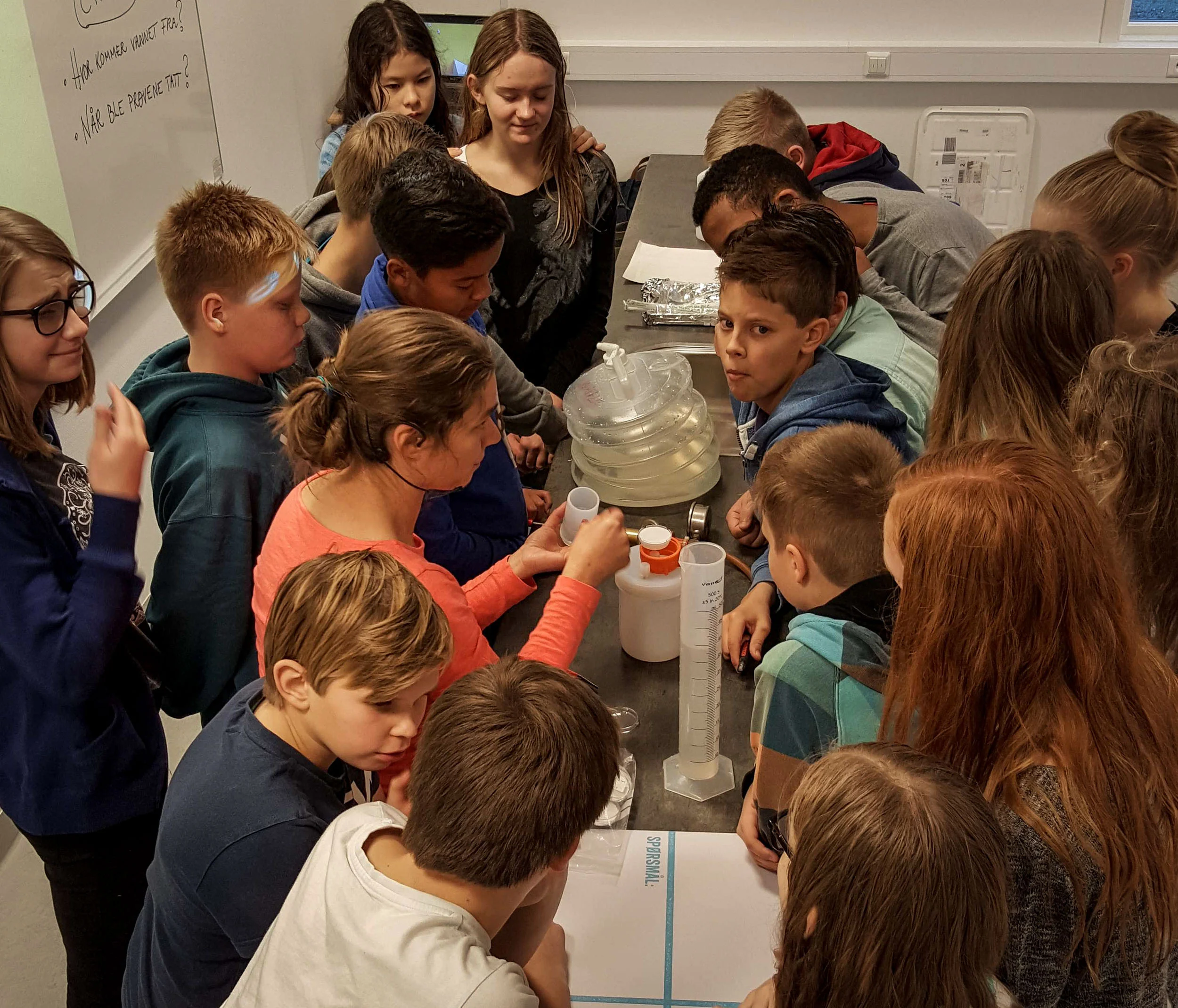 Students from Bardufoss ungdomskole in Norway learning to filter river water samples from Målselv. JONAA©Siri Beate Arntzen