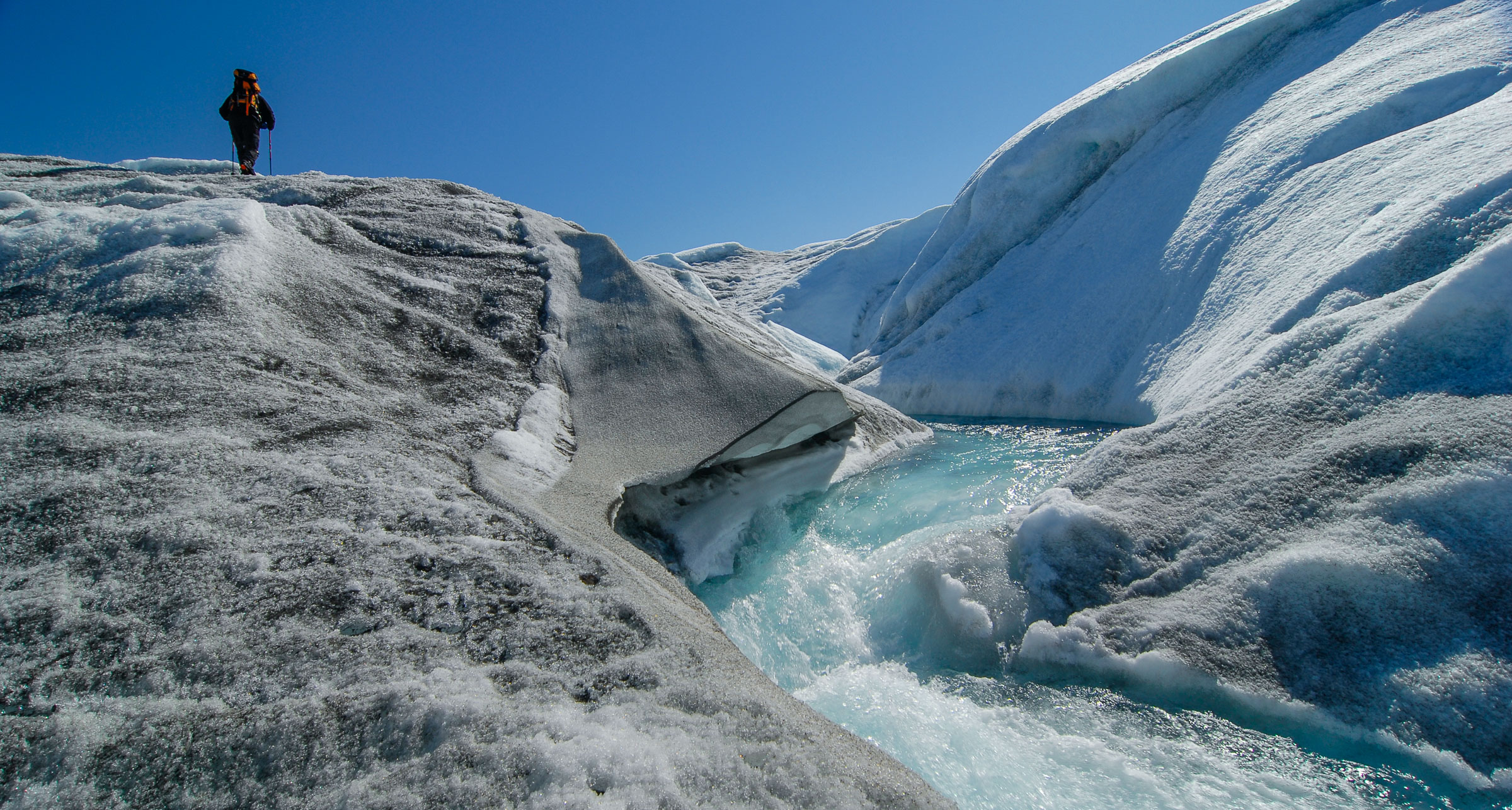 Warmer air temperatures and darker glacier surfaces that absorb incoming sun radiation instead of reflecting it,  are both growing contributers to increased glacier melt.  JONAA©Kristjan Fridriksson