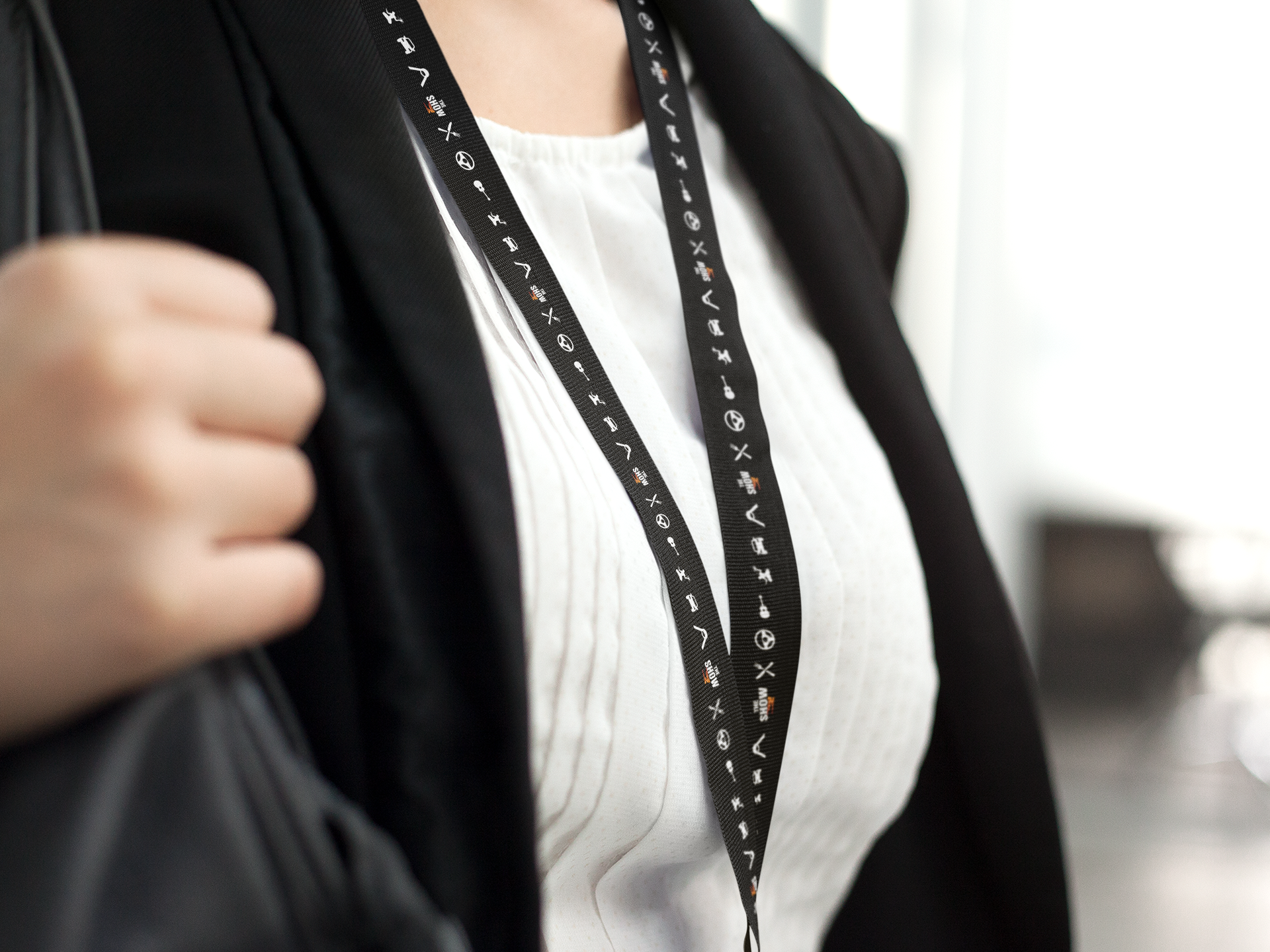 close-up-of-a-young-girl-leaving-the-office-wearing-a-lanyard-mockup-a15151 copy.png