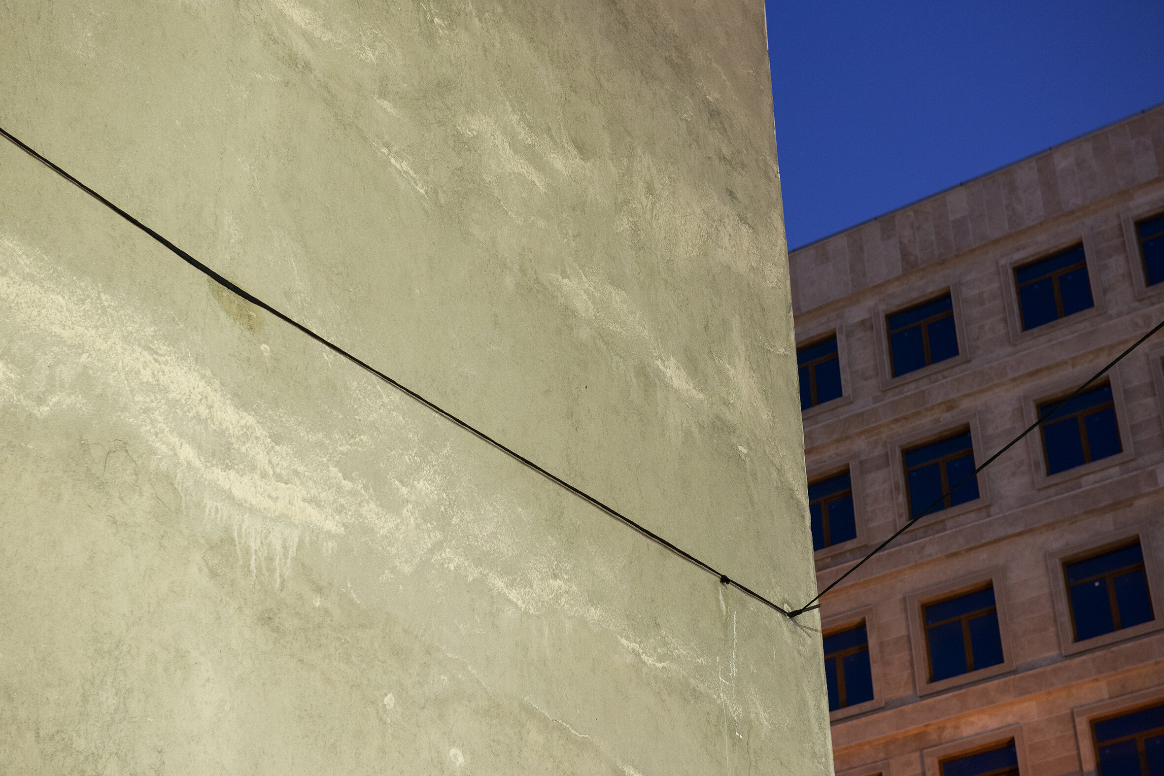  Untitled (Territory of the Semiotic)  49 meters of lace, 4 iron rods, 2 hooks Installation (بدون عنوان (قلمروامرنشانه شناختی  *Formally, similar to the usage of an  Eruv  in Judaism, a 49 meters long rope mad of the same lace used in the entire inst