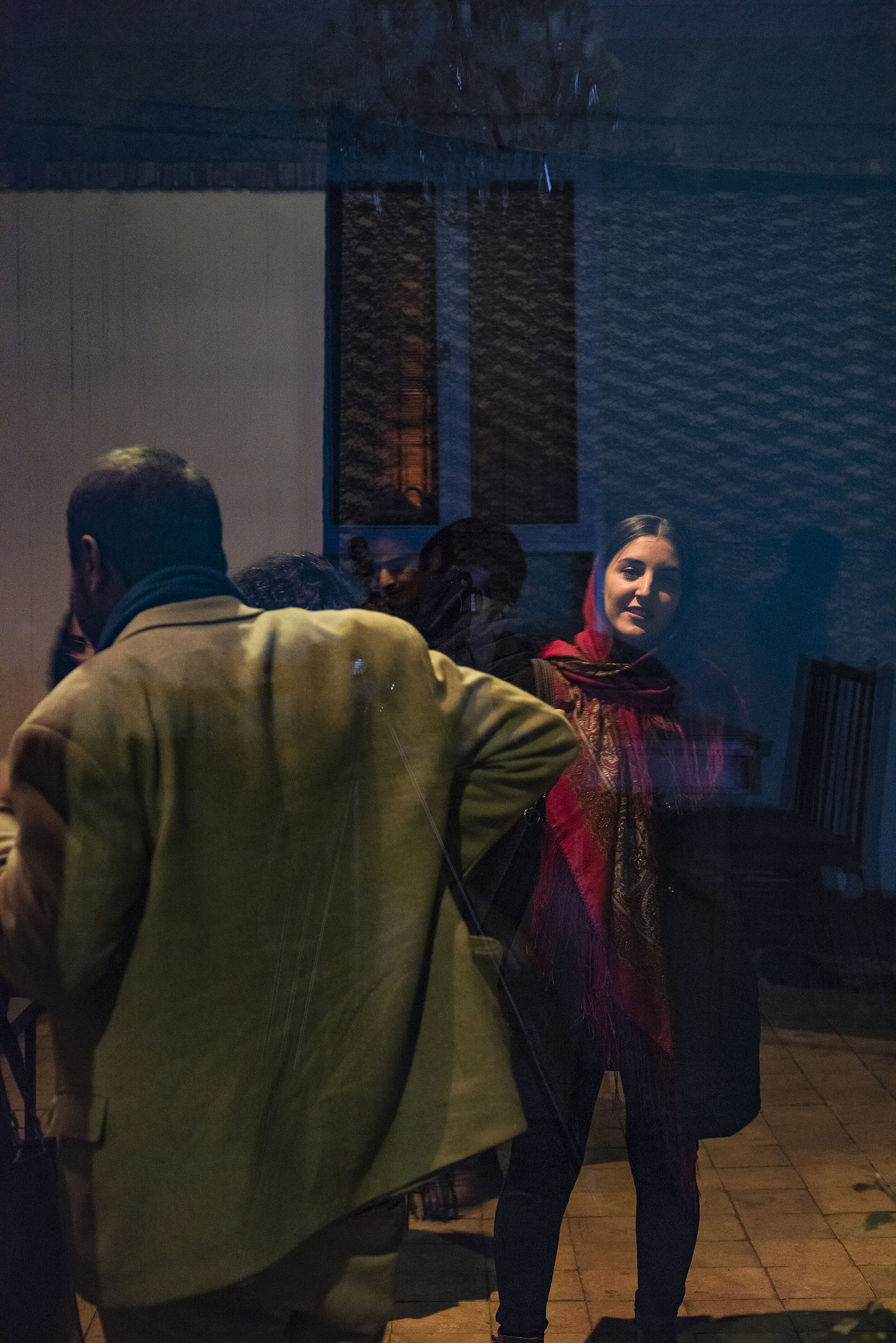   *The POV of a visitor from inside “the communal room” who is gazing at another visitor standing in the courtyard of the gallery and checking on their look in the mirror side of the one-way mirror, without realizing she is being gazed at.  