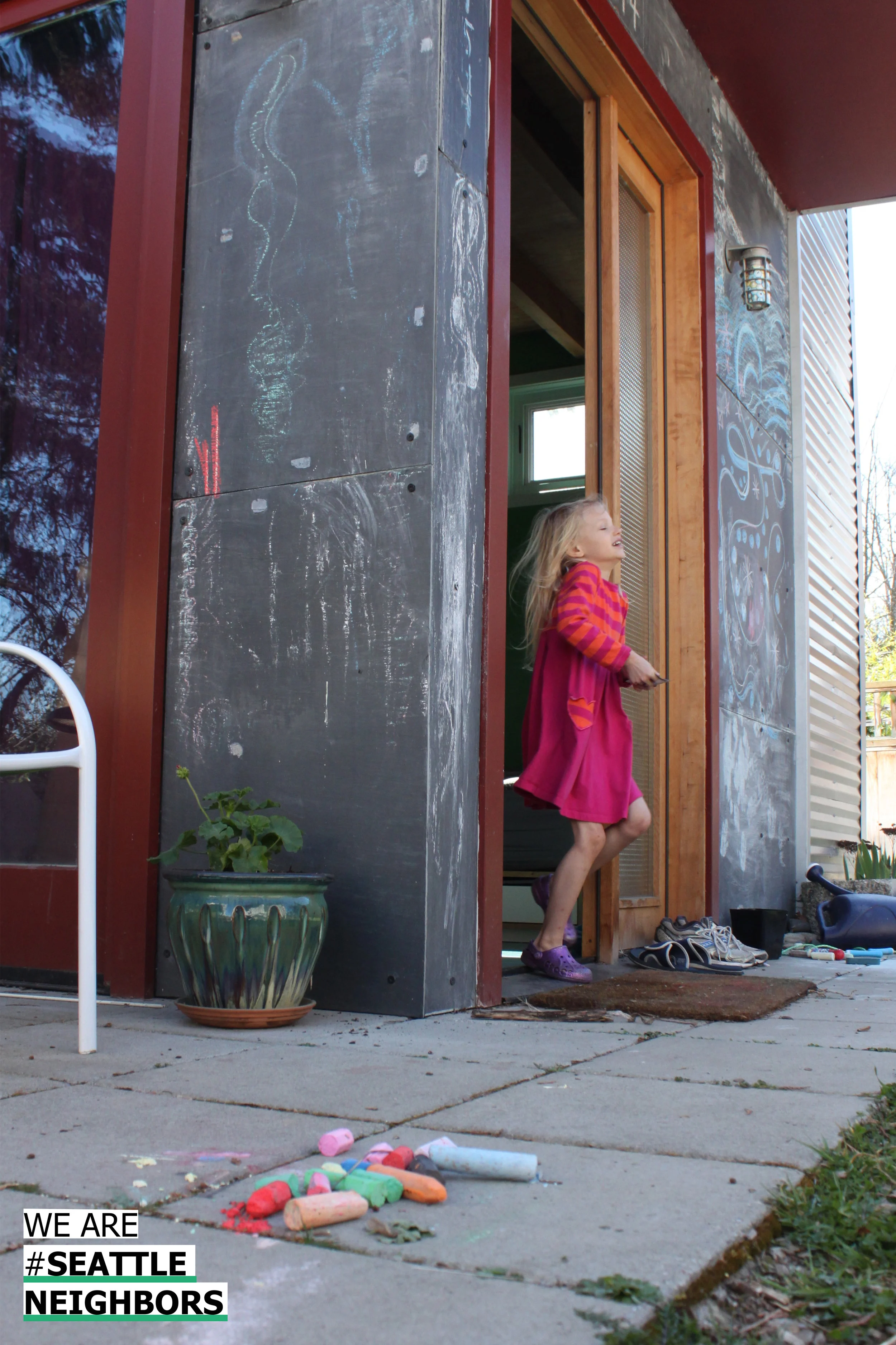 Rachael and Adam decided to paint a portion of their DADU exterior so that it could be written on with chalk.