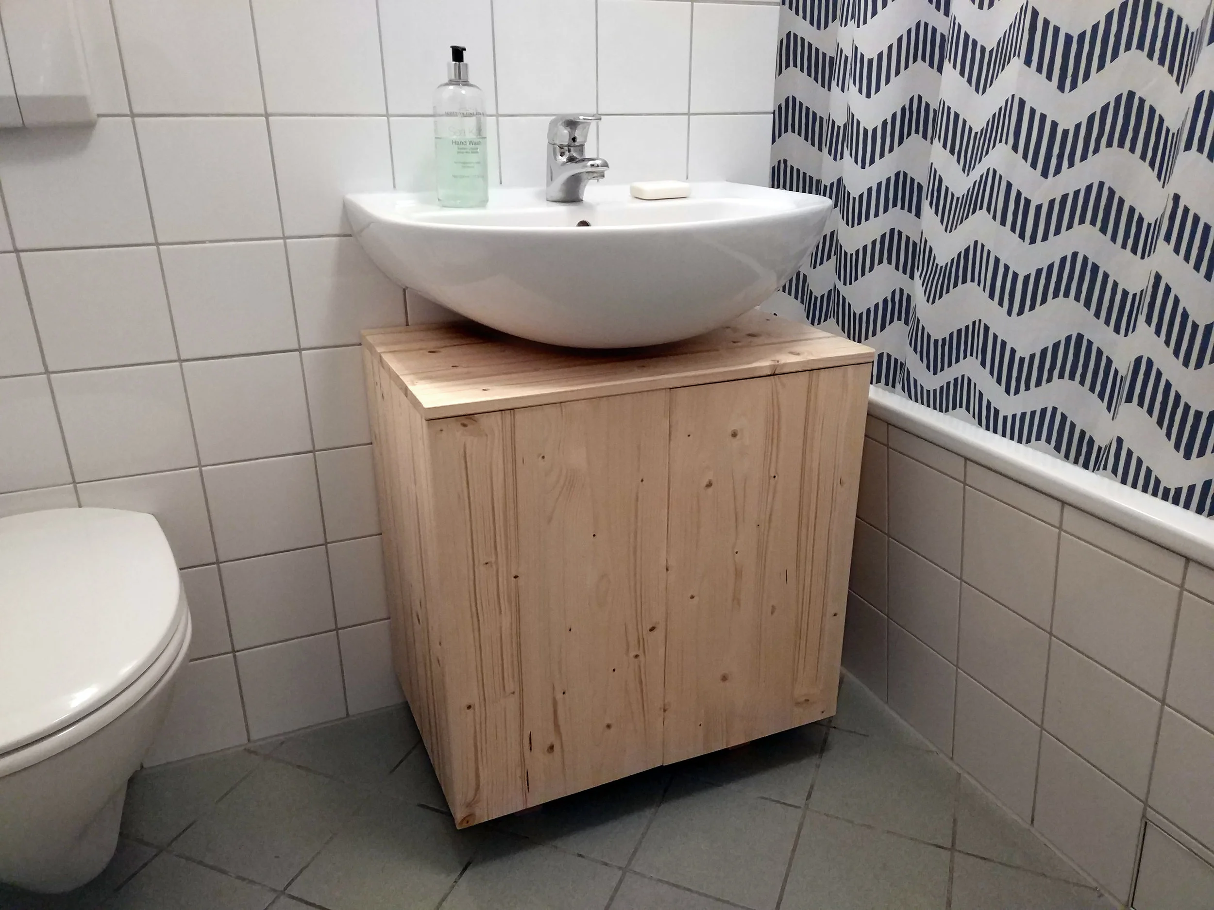 Under-sink cabinet. Click here for more info