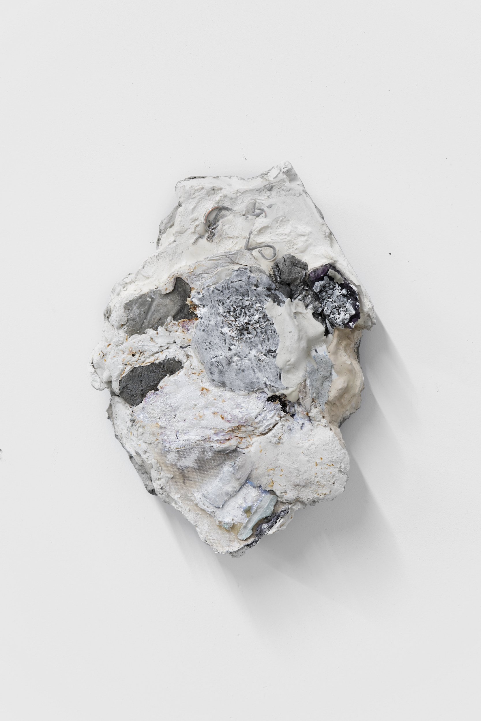 Laur P,  Now carrying an eternity of dysphoric refractions , 2024, Plaster, cement, canvas, steel wool, nail polish, dry pigment, amethyst (from childhood collection), cigarette wrappers, metal chain puzzle, acrylic paint, desiccant packet, paper pu