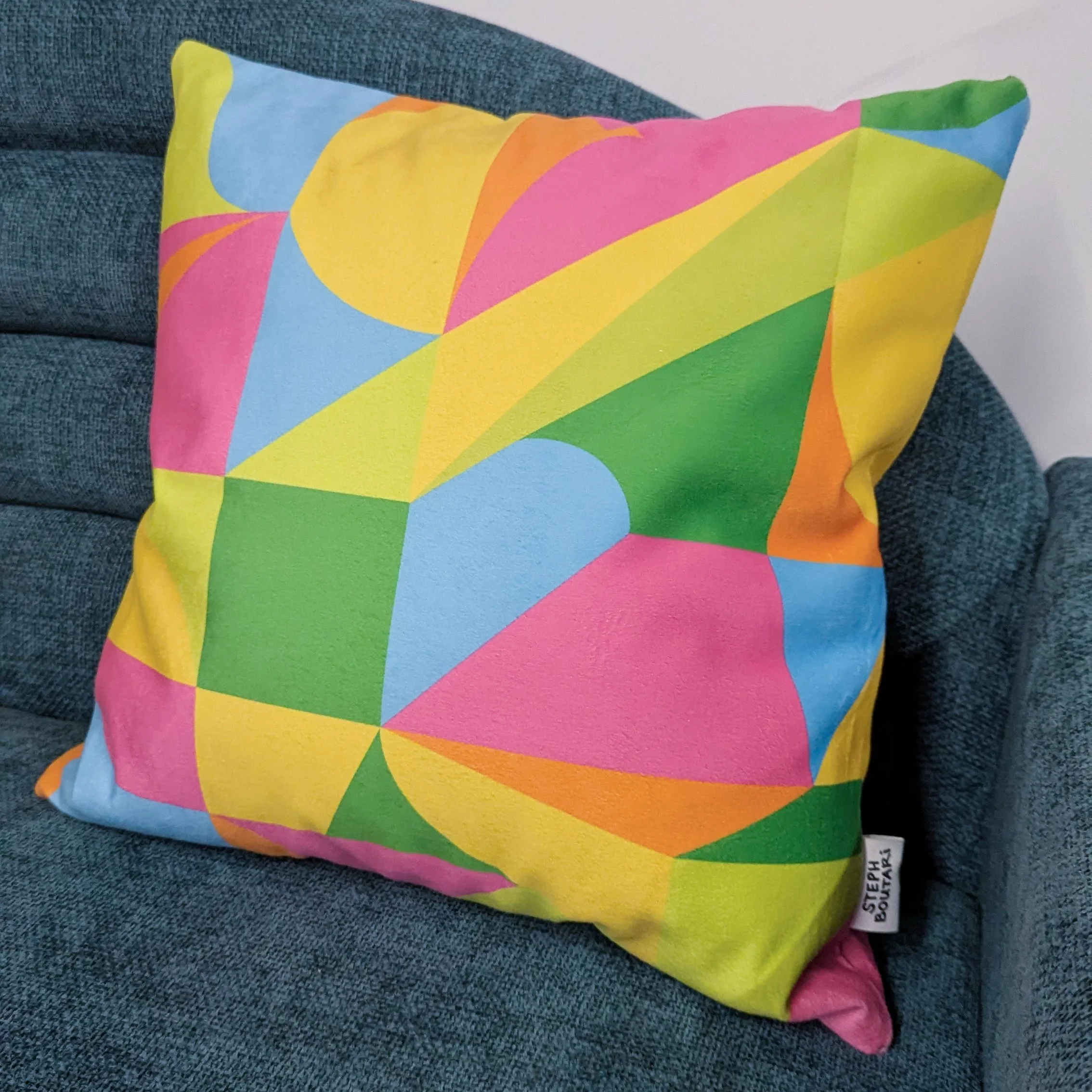 Spring cushion on teal couch_detail.jpg