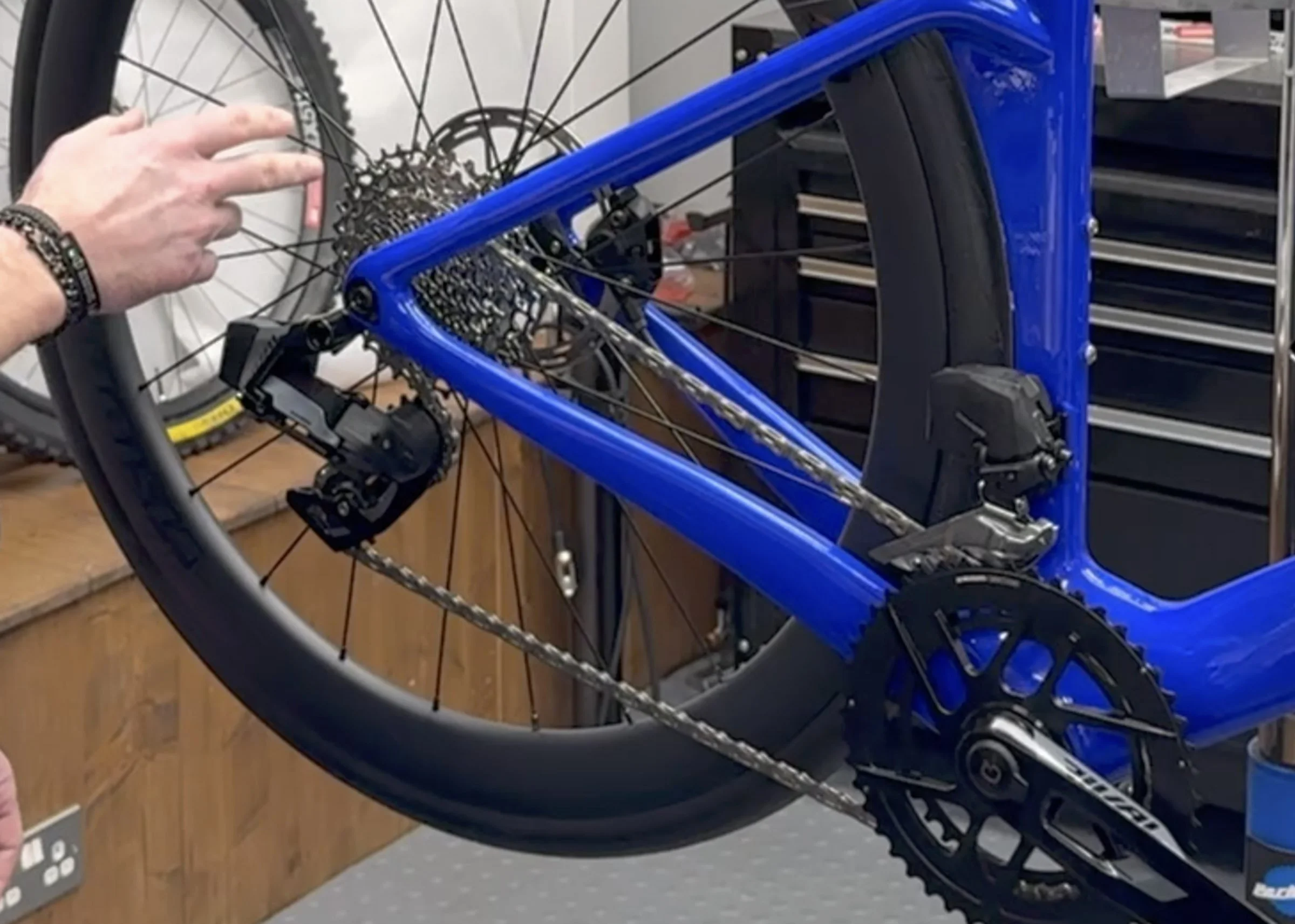 SRAM Rival E1 AXS drivetrain with 48 35 chainrings and 10 36 cassette on LIOS youth triathlon bike