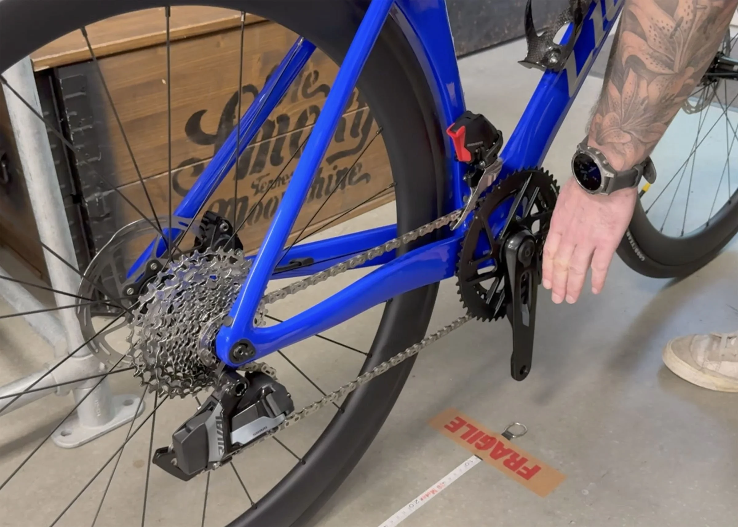 Bike rollout test with rider on the bike for British Triathlon gear restriction measurement