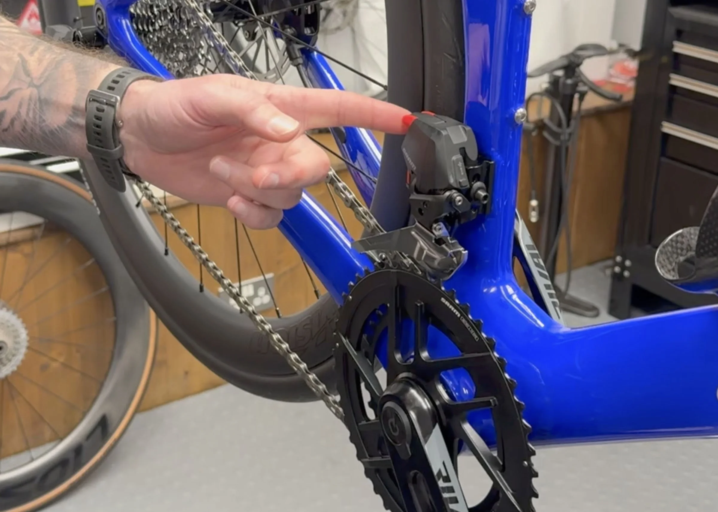 SRAM AXS front derailleur battery removed to lock small chainring for British Triathlon rollout compliance
