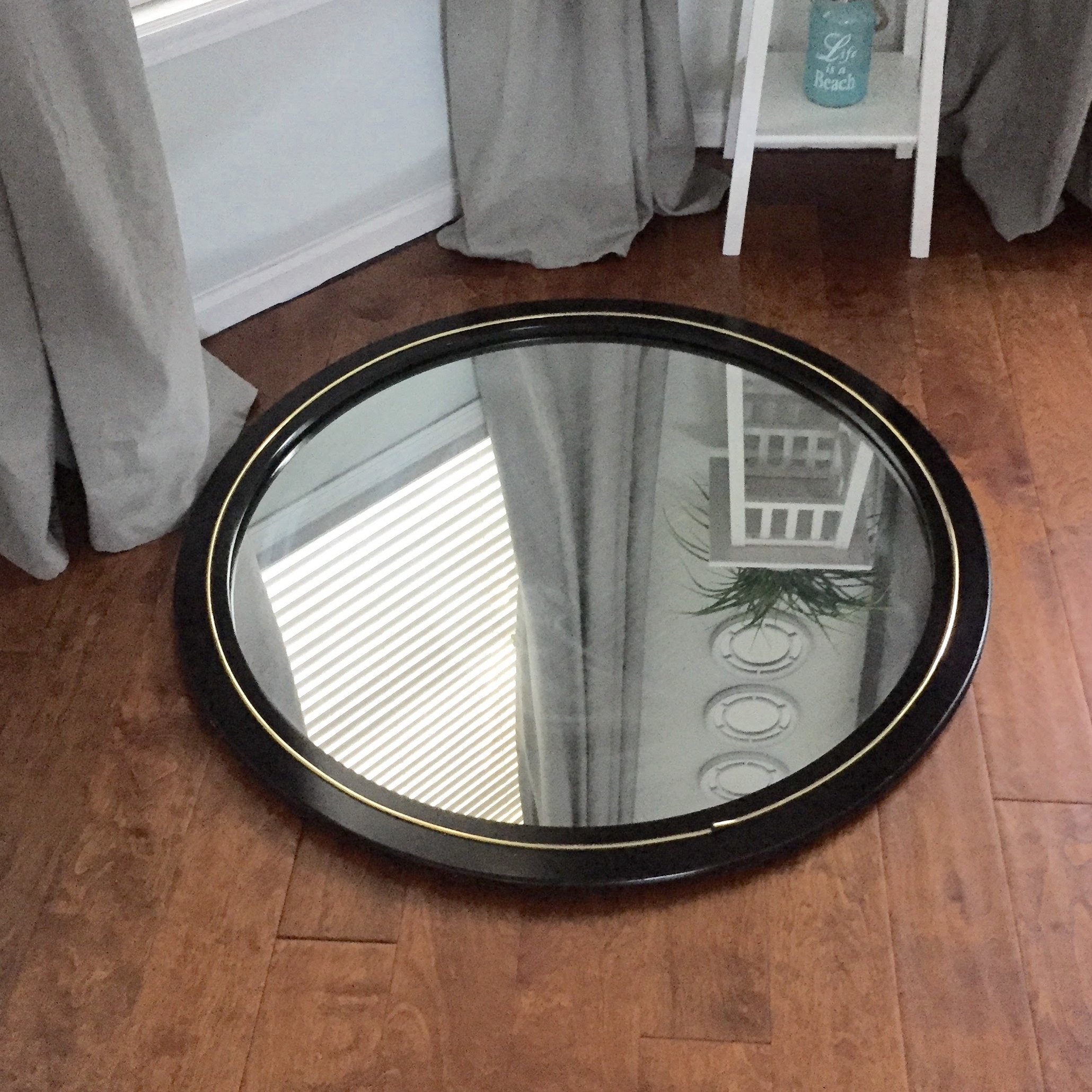 The perfect mirror, in its original, hideous, black and gold form.